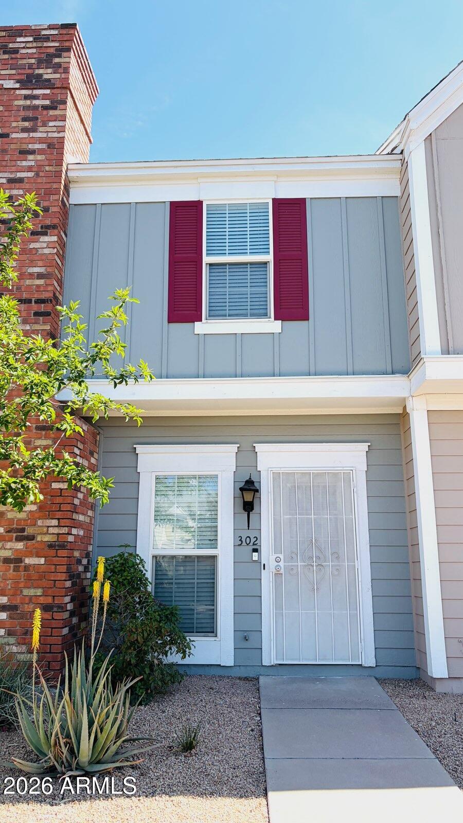 Welcome to this 2-bedroom townhome in the heart of Chandler, just minutes from Gilbert. The kitchen features refreshed cabinetry with a stylish sage finish, stainless steel GE range, and double sink. Upstairs, two comfortable bedrooms are filled with natural light, including a larger bedroom with fresh paint, high ceilings, a ceiling fan, and mirrored closet doors. Freshly painted hallways give the upstairs a clean, move-in ready feel. Enjoy the community's sparkling pool surrounded by mature trees and desert landscaping -- perfect for Arizona summers. Covered assigned parking, close to top-rated schools, parks, and all the shopping and dining the East Valley has to offer. A solid opportunity in a convenient Chandler location!