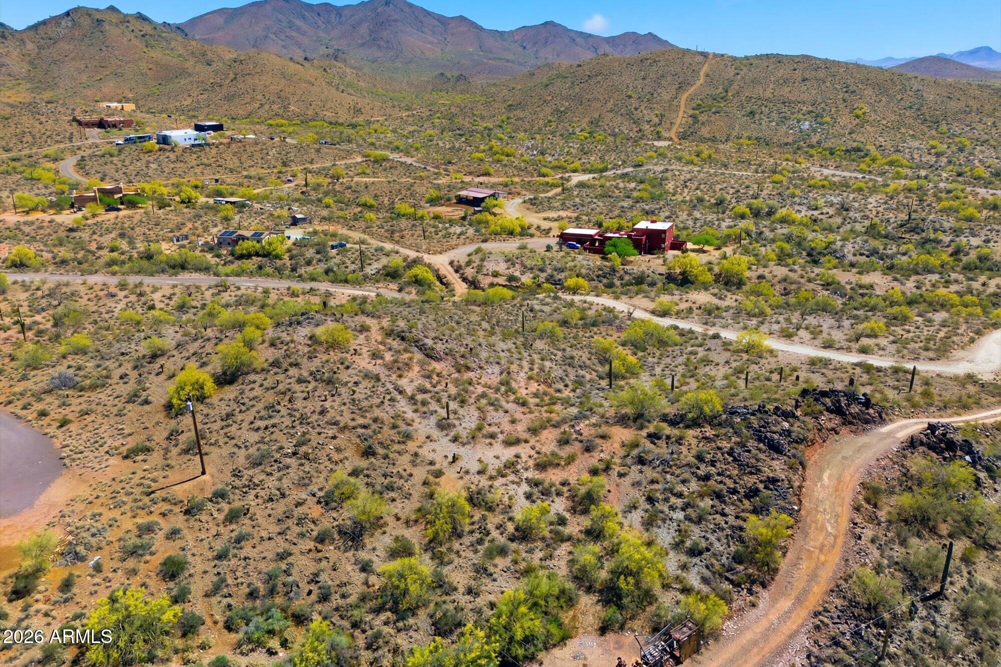 New roads being built in this area, come and see this expansive 2.5-acre vacant lot in scenic New River! Enjoy the perfect balance of privacy and convenience, with easy access to major freeways for commuting. Surrounded by natural desert beauty, this parcel offers plenty of space for outdoor living, RV parking, or even a small hobby farm. With utilities nearby and a location that combines tranquility with accessibility, this lot is a rare opportunity to create your own oasis in a highly sought-after area. Don't miss your chance to invest in this prime New River property!