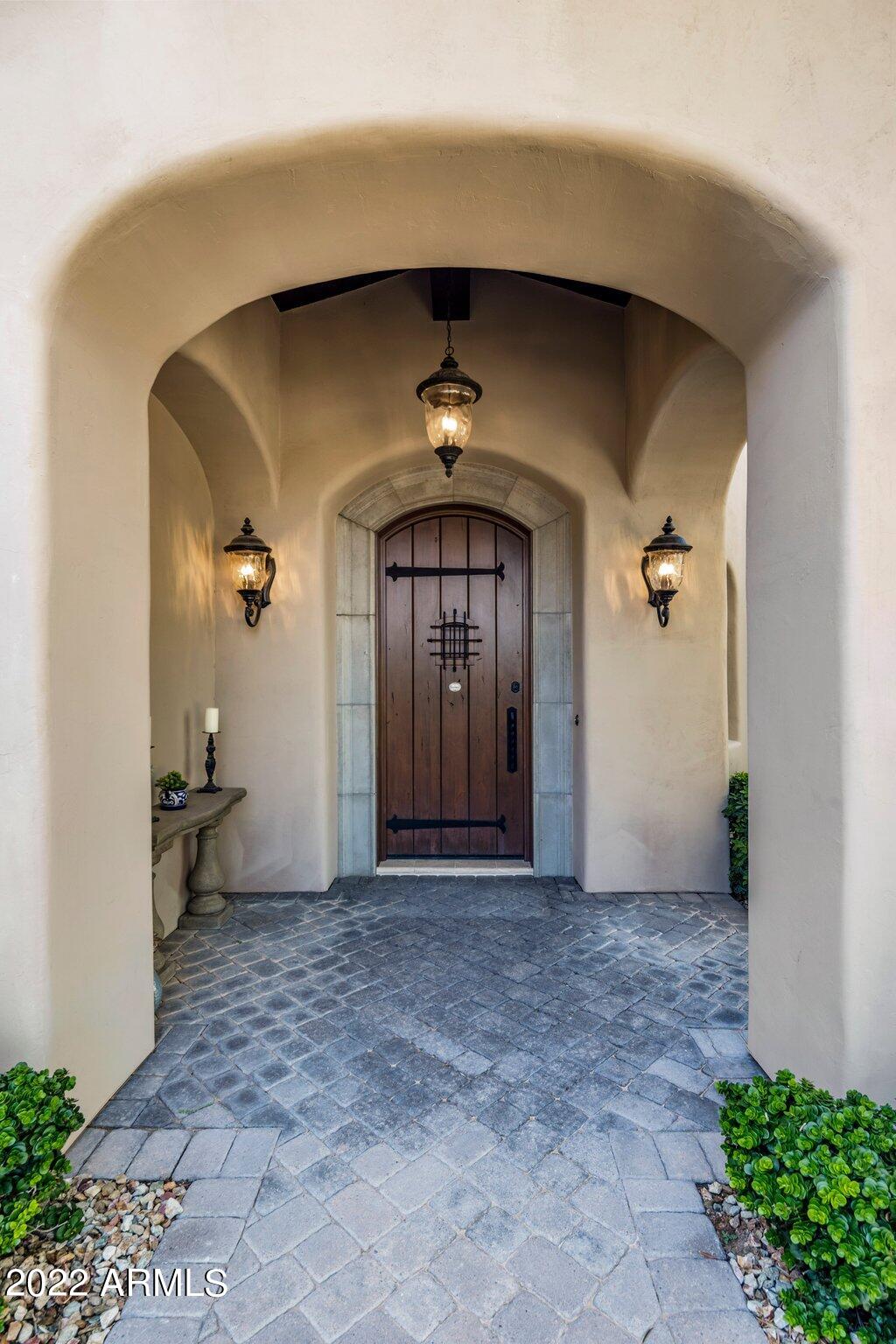 NEVER BEFORE ON MARKET – CUSTOM BUILT EUROPEAN MEDITERRANEAN IN ICONIC GATED JUDSON. THIS HOME SITS ON AN INTERIOR CUL-DE-SAC 1.53 ACRE LOT, WITH PUTTING GREEN & LUSH SANCTUARY GROUNDS & CAMELBACK MTN VIEWS FOR CREATING YOUR OWN STORYBOOK MEMORIES. CLASSICAL QUALITY ARCHITECTURE, GROIN VAULTED TROMPE L'OEIL CEILINGS, COFFERED WOOD & BEAMED CEILINGS, STONE FIREPLACES & EXQUISITE WOODWORK THROUGHOUT. A KITCHEN FIT FOR A COOKING SHOW W/STEAM OVEN-DOUBLE OVENS, DUAL SINKS, DOUBLE DISHWASHERS, IN-COUNTER FRYER, & MORE. BUTLER'S PANTRY/WALK-IN PANTRY/& TEMPERATURE CONTROLLED WINE CELLAR. PRIMARY SUITE/SITTING AREA/GYM & STEAM SHOWER & SOAKING TUB, & (2) LARGE WI CLOSETS. LIBRARY/OFFICE, GAME ROOM,  GUEST SUITE & (2) SECONDARY BEDRMS + A 2ND PRIMARY SUITE/BATH/WI-CLOSET – ALL SPLIT. (SEE ADDT'L.. 4-CAR GARAGE W/SEPARATE WORKSHOP AREA & LOTS OF STORAGE & EXTRA PARKING. CIRCULAR DRIVE, HEATED POOL/SPA, GRASSY LAWN. PUTTING GREEN, VIEWING DECK & INTIMATE ENTRY FOUNTAIN.  IF YOU ARE LOOKING FOR AUTHENTICITY -THIS HOME HAS IT ALL! THE NEW RITZ CARLTON RESORT - MINUTES AWAY & MORE. SEE FLOOR PLAN AT DOCUMENTS TAB.