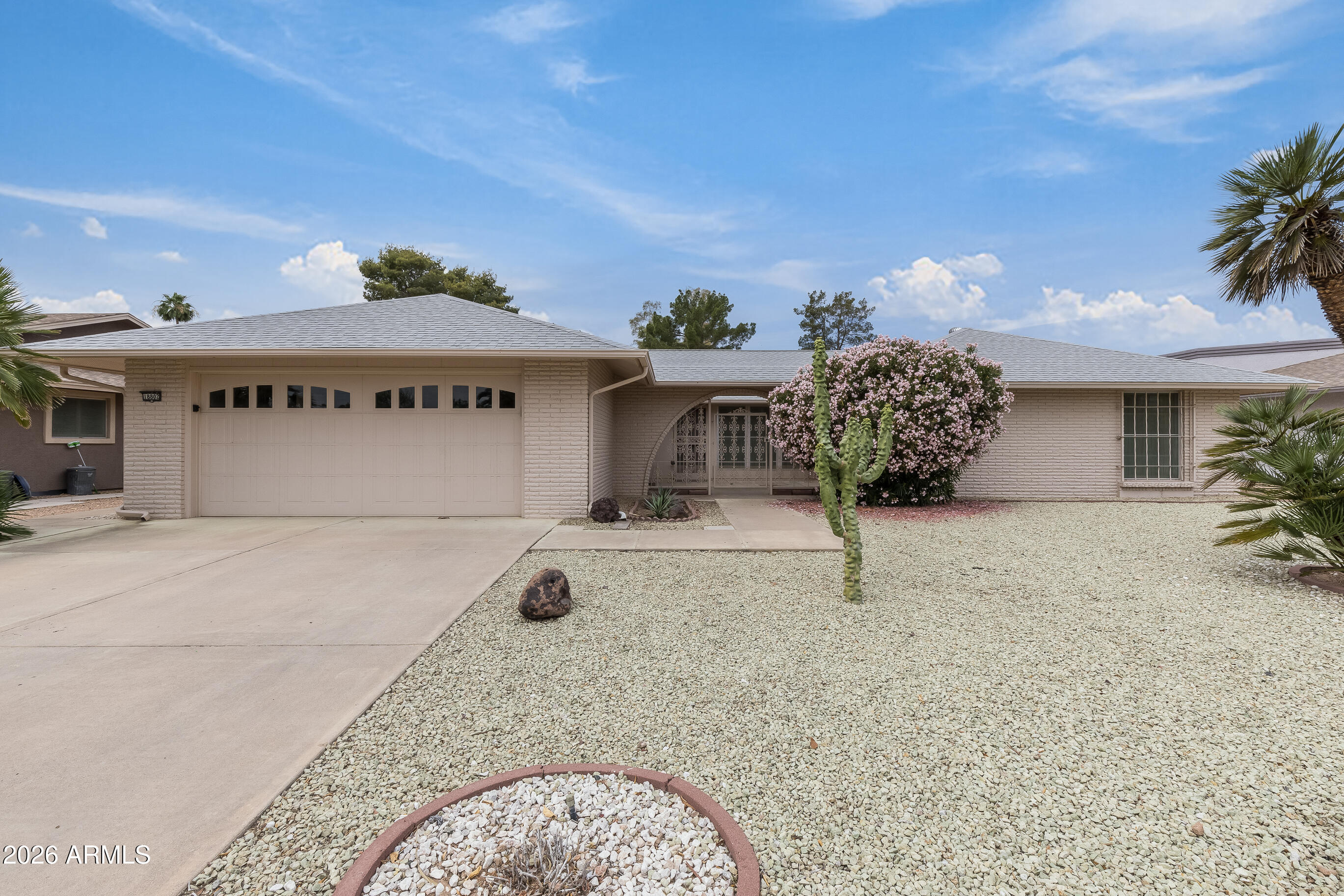Beautifully situated 3 bed, 2 bath single-level home with desirable split floor plan and stunning  golf course views. Features formal living and dining rooms plus a spacious family room ideal for everyday living. Charming courtyard entry sets a welcoming tone, while the enclosed Arizona room offers year-round enjoyment of serene golf course vistas.

Located just moments from the recreation center, providing easy access to Sun City amenities including golf, pools, fitness centers, clubs, and social activities. Ideal for full-time or seasonal living, this home offers a lock-and-leave lifestyle in a premier active adult community.