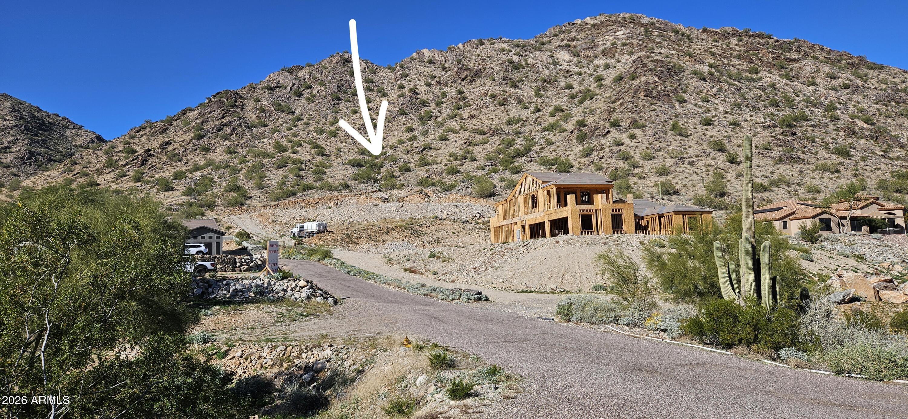 Gorgeous view lot, mountainside, ready for your dream home, no HOA, pad is almost done.  PLEASE DO NOT ATTEMPT TO DRIVE UP TO THE LOT, PARK BELOW AND WALK UP THE ROAD.  Seller is in the process of leveling the lot.  One of a kind!  Once it's gone, it's gone!