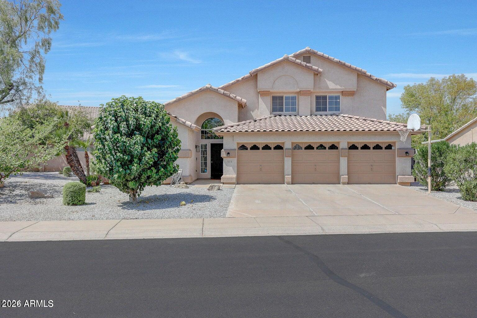 Experience Waterfront Living on an almost 11,000 sq ft lot in the Garden Lakes community! Welcome home to a beautifully updated 4-bedroom, 2.5-bath RESORT Style residence that offers stunning Lake and Mountain Views, a private heated POOL, and LAKE access from your private Dock.  Garden Lakes residents enjoy boating, fishing and water recreation year round.  The desirable floor plan features a primary suite on the main level (downstairs) with lake views, and a spacious en-suite bathroom with a separate bathtub and shower.
Inside, soaring ceilings, abundant natural light, and a dramatic FIREPLACE create an inviting atmosphere. The remodeled kitchen showcases granite countertops, stainless steel appliances, and ample cabinet space, white oak flooring plank t/o, 2 HVAC units 2021, w/d incld Upstairs, you'll find additional bedrooms and a large loft/gameroom with direct access to a large Balcony that spans the back of the home, overlooking the lake and pool. Situated on an oversized waterfront lot, the backyard is designed for enjoyment and relaxation!  Mature landscaping complements the breathtaking water views
Conveniently located near parks, schools, shopping, dining, and major freeways, this exceptional Garden Lakes property offers the perfect blend of comfort, style, and Arizona outdoor living.