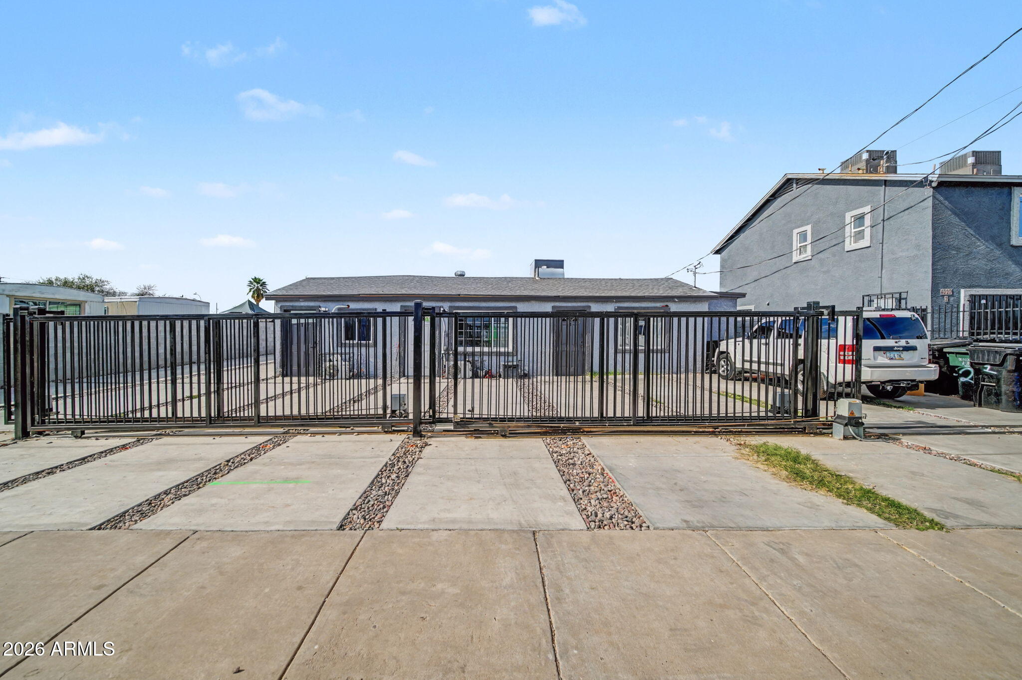 Turnkey investment opportunity with ALL units FULLY OCCUPIED! featuring a fully remodeled multi-building INCOME property with modern finishes throughout.  Gated entry with remote access, plus ample parking with both covered and uncovered spaces. Well-maintained and ready for continued cash flow. Building One includes three apartments: one 2 bed/2 bath and two 1 bed/1 bath units, all with kitchens and W/D hookups. Buildings Two and Three offer four identical 1 bed/1 bath units with living rooms, kitchens, W/D hookups, and private back patioS! The property also includes two newer mobile homes with primary bedrooms, en-suite baths, and W/D hookups.