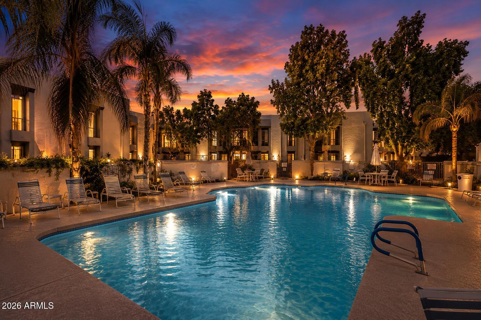 A rare opportunity to own a meticulously appointed ground-floor residence in the exclusive Cloisters at the Biltmore. Located within the prestigious guard-gated Biltmore Estates, this elegant home seamlessly blends sophisticated design with effortless comfort, featuring an open-concept floor plan filled with natural light, designer finishes, custom lighting, and premium appliances throughout. Rarely found within the Biltmore, this community offers no rental restrictions, creating exceptional flexibility for investors, seasonal residents, or those seeking a lock-and-leave lifestyle.