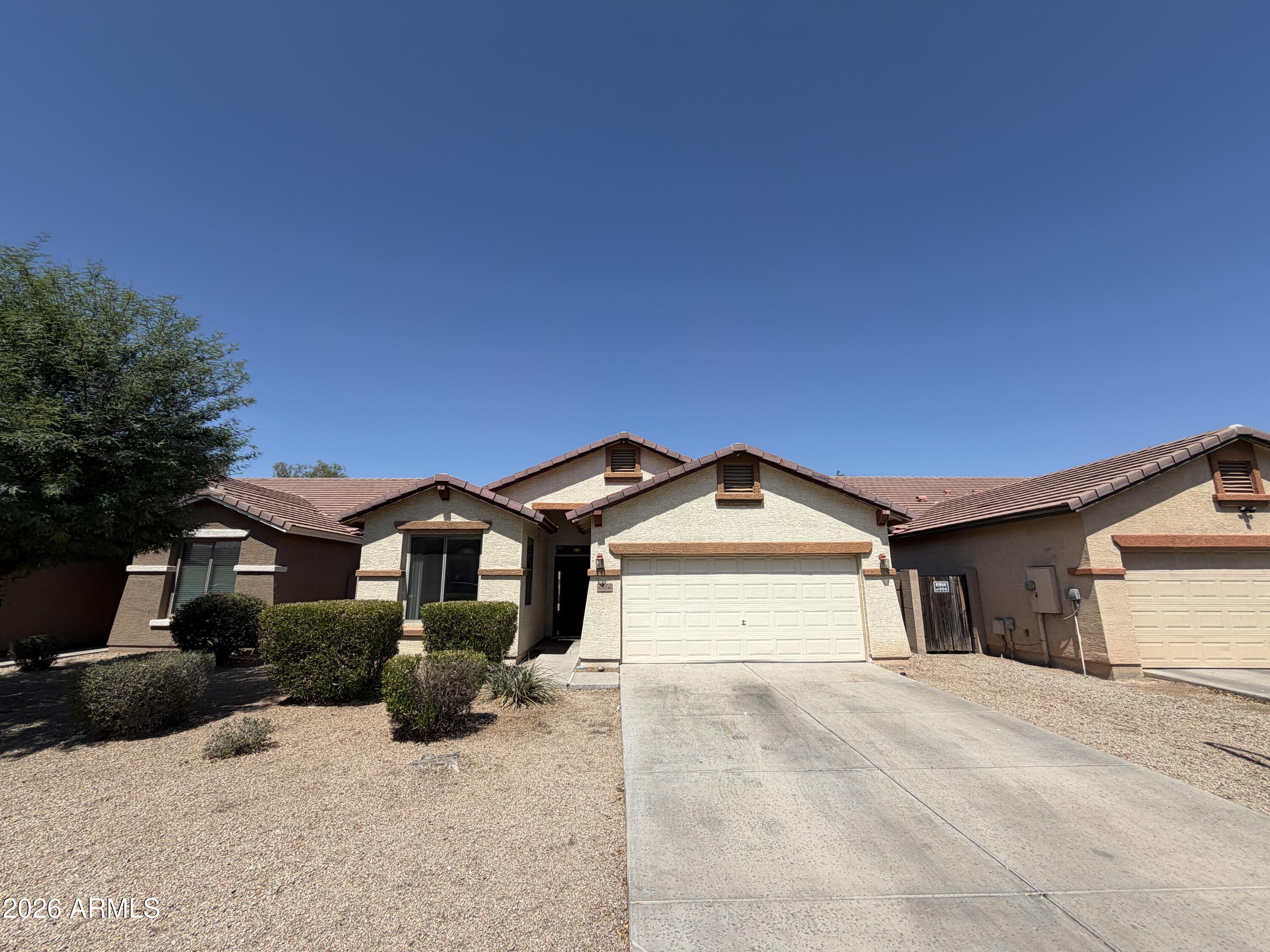 Beautifully updated 4-bedroom, 2-bath home located in the highly desirable Amber Ridge community. This move-in ready home will feature brand-new tile flooring throughout and fresh interior paint, creating a modern, clean, and inviting living space.

The spacious kitchen offers ample cabinet and counter space, a breakfast bar, and a cozy dining nook that opens to the large living area--perfect for both everyday living and entertaining. Step outside to a covered patio and enjoy the privacy of the low-maintenance desert landscaped backyard.

Residents of Amber Ridge enjoy access to  scenic walking paths, greenbelts, and parks, all conveniently located near shopping, dining, schools, and major commuter routes. Don't miss the opportunity to make this beautifully refreshed home yours!