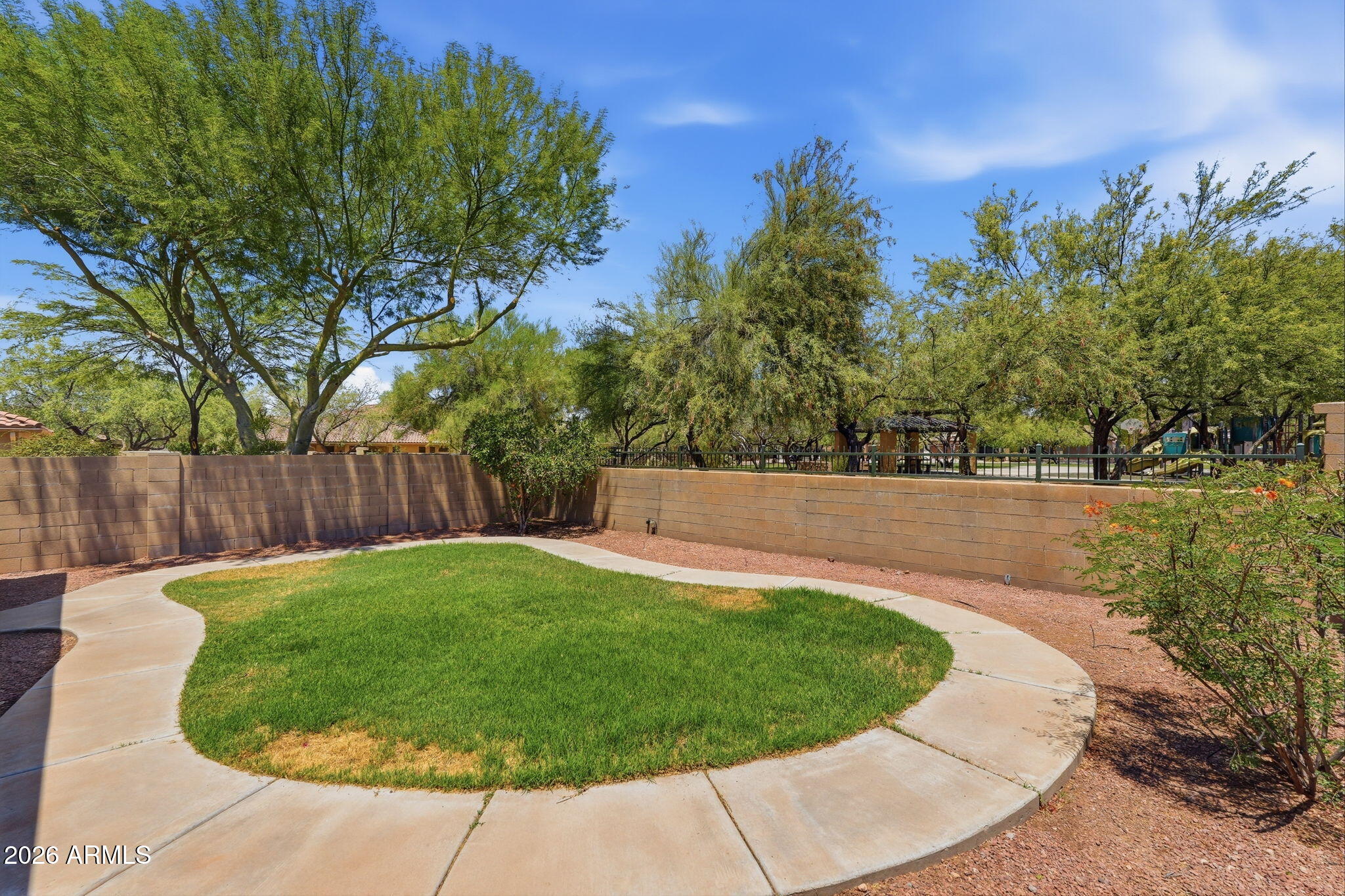 Popular Holiday model in Anthem Parkside on a PRIME lot! Backed to the park with views of the park AND  a peek of Daisy Mountain - it doesn't get better than this! Desirable N/S exposure. Backyard features grass area & concrete walkway with partial view fencing to soak in the beautiful surroundings. Inside: eat-in kitchen with island, breakfast bar, granite counters, maple cabinets with pullouts, new luxury plank floors in main living areas & fresh interior paint. New plush carpet in bedrooms. RO system. One of Anthem's most desirable pocket parks is right out your back door - enjoy the views and activity from your own living room! Two blocks from Diamond Canyon K-8, Liberty Bell Park & the splash pad - the convenience here is unmatched. This location is a 10/10. Don't miss it!