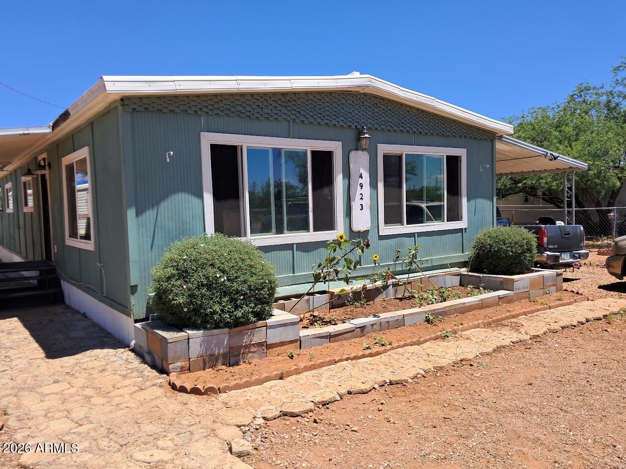 Affordability Knocks with this 1973 3 bed 2 bath Manufactured Home in Sierra Vista Property is Fully Fence and has gravel landscaping.  Sold As Is