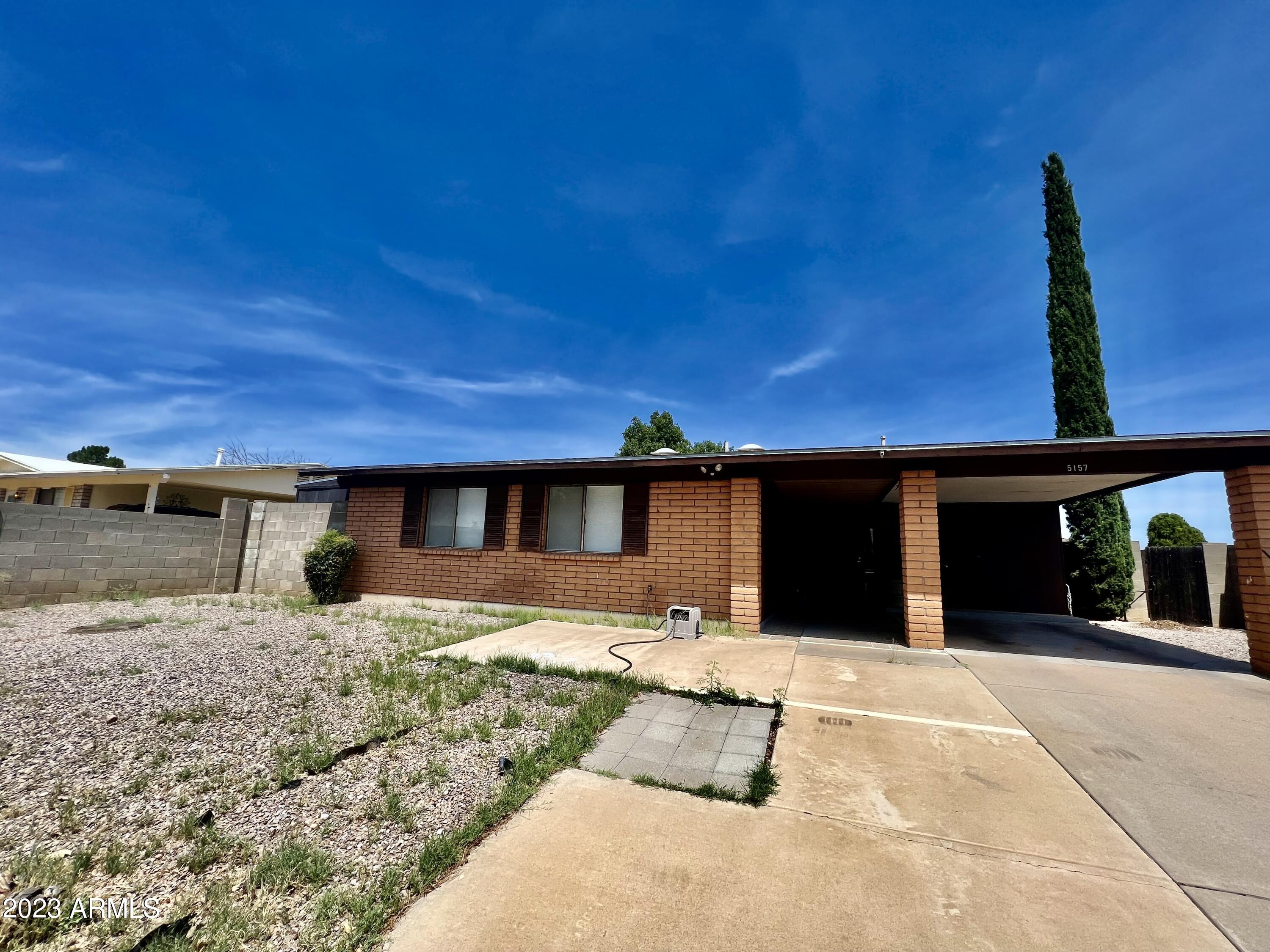 Welcome to your 3 bedroom, 2 bathroom haven, where modernity meets convenience. The kitchen sparkles with newer stainless steel appliances and an air fryer-equipped electric stove for culinary enthusiasts. Bask in the allure of the large backyard, featuring a concrete pad and a majestic mature tree, ideal for creating unforgettable memories. An inviting Arizona room awaits, offering year-round enjoyment. With 1450 sqft and a carport, this charming home is your gateway to an enriching lifestyle. Don't wait, embark on this thrilling journey to a brighter tomorrow! 🏡🌳🌵
