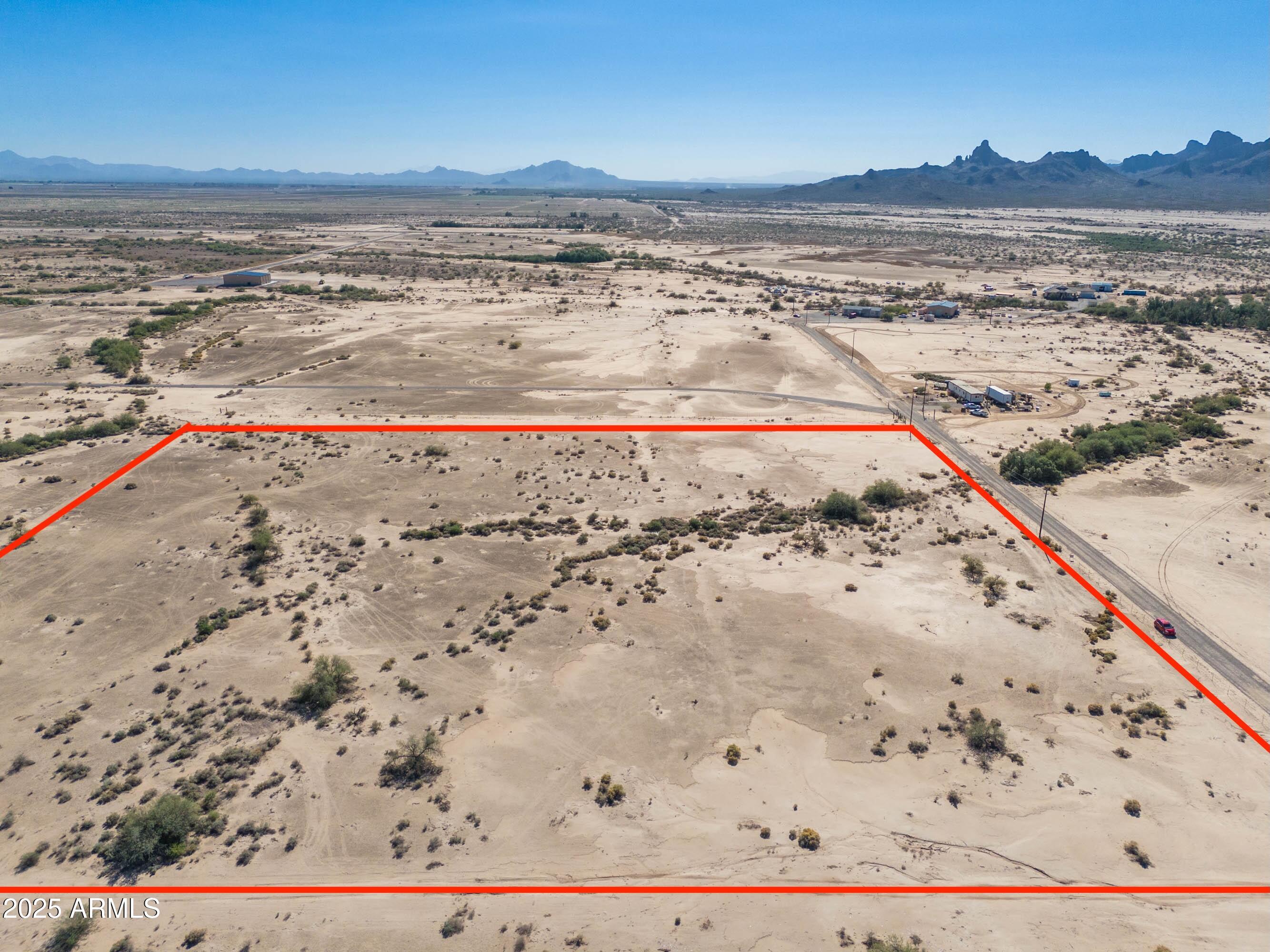 10 acres with Stunning Sawtooth Mountain views!! Looking for the perfect spot to build your dream home? This 10 acre parcel south of Arizona City offers wide-open space, breathtaking views of the Sawtooth Mountains and endless opportunities for your ideal lifestyle. Power is at the lot line, shared well is in place and there's tons of room for a custom home and workshop or horse facilities. Relax and watch skydivers or head out to nearby trails for riding. Privacy, space and a true rural desert feel.