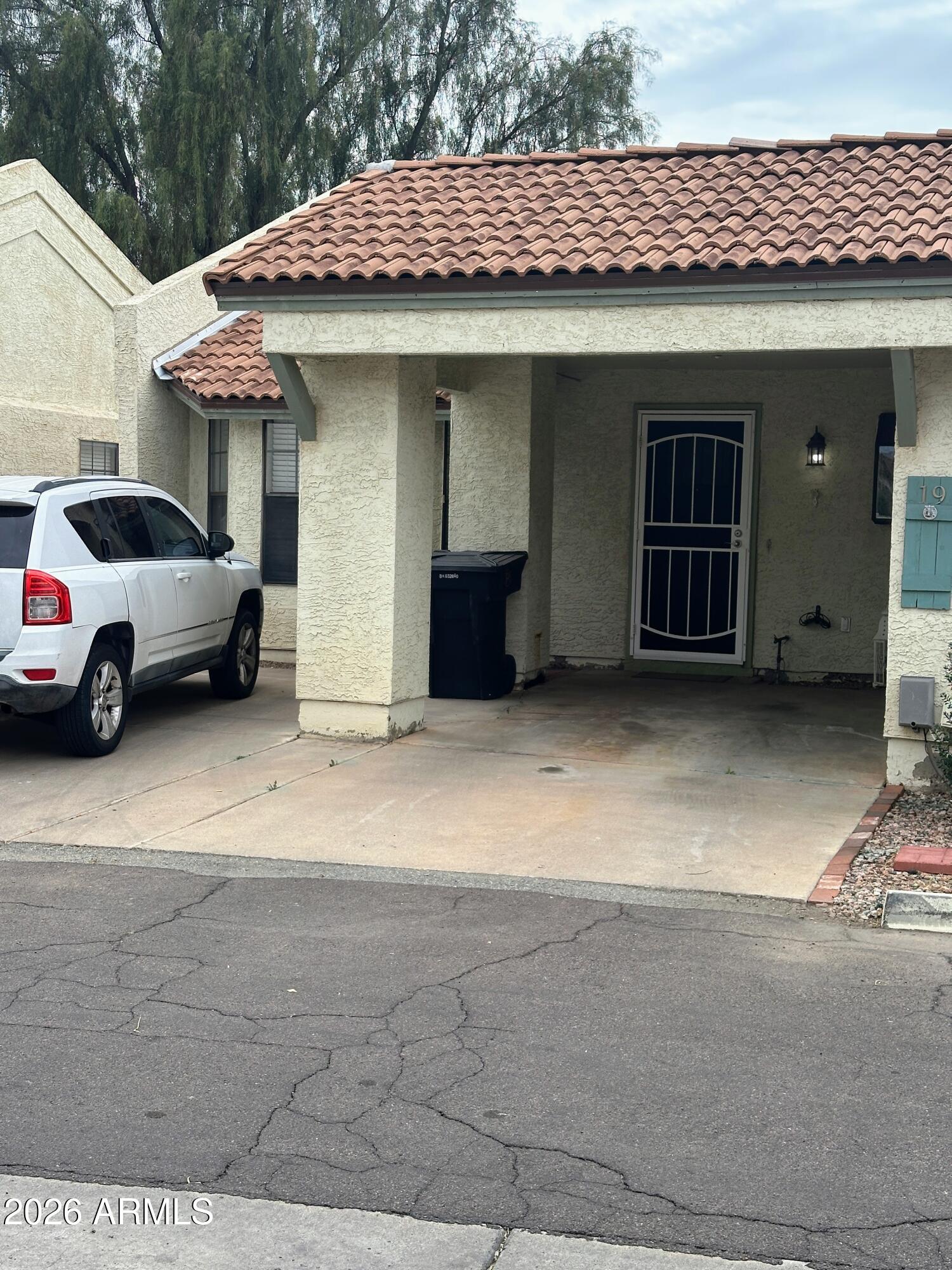 Cute 2 split bedroom unit; both bedrooms have en suite bathroom.Secondary bedroom and bathroom have justbeen updated. This is a beauty and priced to sell! Private carport in front, private patio in rear.
Interior stackable laundry machine. HVAC is a 3-ton unit replaced in 2020. HOA repaired roof in 2022.