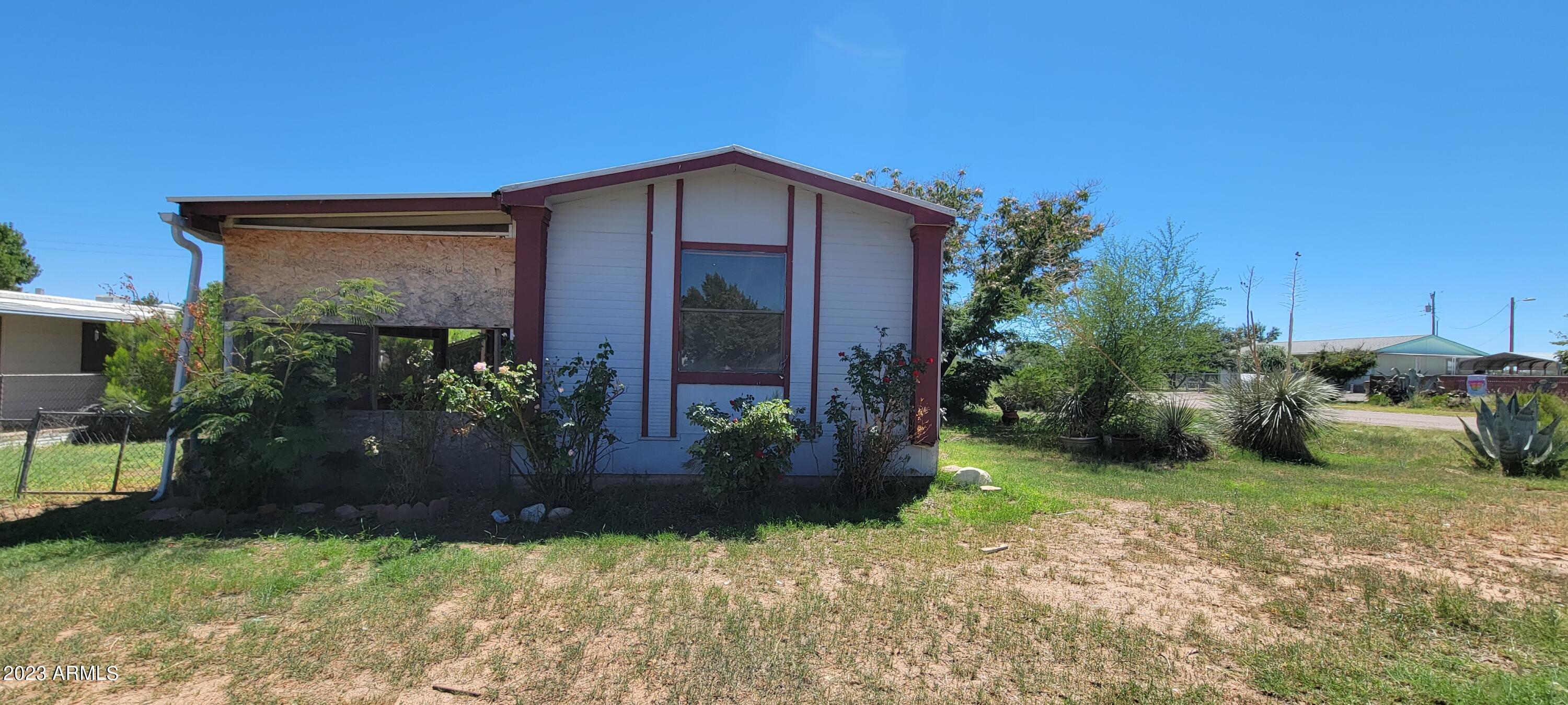If you are looking for a very low cost property, this is it. This home has a split plan. The master bath is quite large and there are 2 closets in the master bedroom. There is a large carport that should fit as least 2 cars plus a couple of storage buildings. All this on a corner lot.
