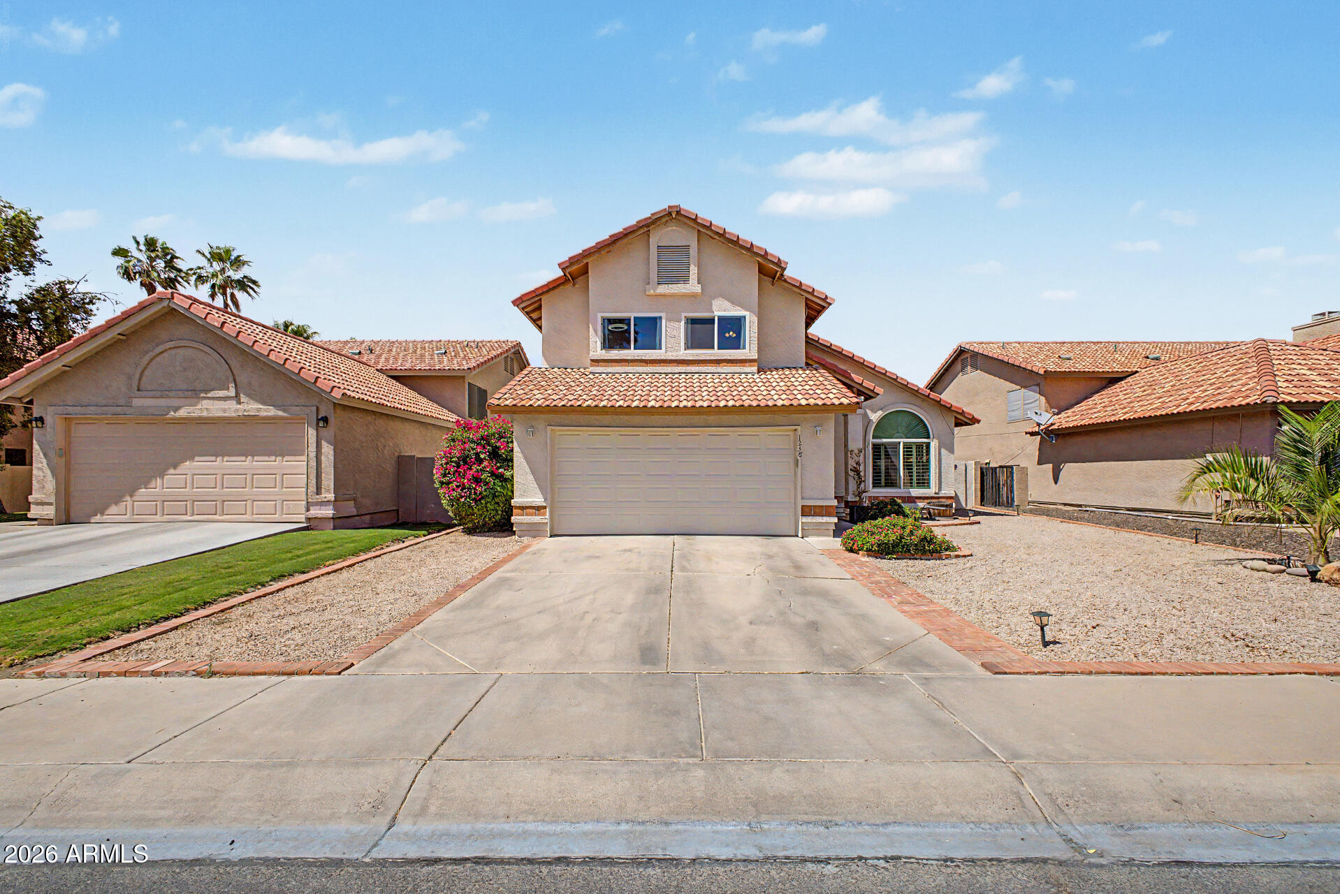 Welcome to 1238 W Seashore Drive in the  Islands community in Gilbert. This home features a newer water heater (2025), and an AC and dual pane windows replaced in 2020 for added comfort and efficiency. Vaulted ceilings create a bright, open feel throughout the living spaces. Enjoy life in a scenic lake community with walking paths and a welcoming atmosphere, just minutes from Downtown Gilbert.