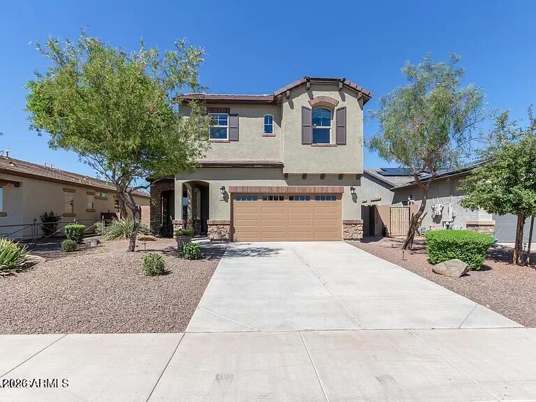 Dreamt of owning a model home!? Here it is! This is a former builder model in the heart of Waddell. This beautifully appointed 2 story home offers 4 bedrooms, 3 full bathrooms, a spacious loft, and a luxurious primary retreat. Designed to impress, the gourmet kitchen features quartz countertops, a large island, upgraded cabinetry, custom backsplashes, and stainless steel appliances. Enjoy an open concept layout enhanced by a dramatic 16' sliding glass door, designer finishes, upgraded tile flooring, and surround sound prewire. The finished laundry room includes cabinetry, washer, and dryer. Move in ready and loaded with premium upgrades, this exceptional home combines style, comfort, and functionality in one incredible package.