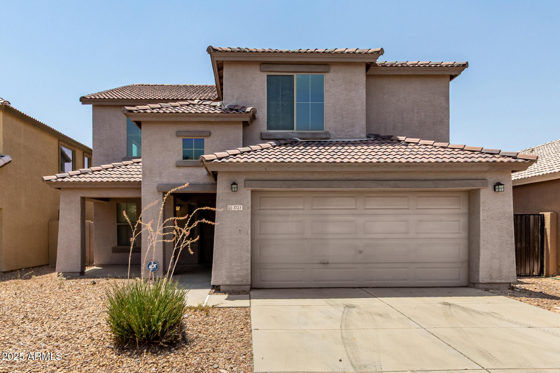 Become the proud owner of this 5-bedroom residence in San Tan Heights! You're welcomed by a stunning living room with soaring ceilings, plenty of windows for ample natural light, blinds, and soft carpeting for added comfort. Gather loved ones in the great room, complete with sliding doors that lead to the backyard for seamless indoor-outdoor living. The kitchen includes abundant wood cabinetry with crown moulding, recessed lighting, built-in appliances, a pantry, and an island with a breakfast bar. The primary bedroom features an ensuite with double sinks and a walk-in closet for an organized wardrobe. Venture out onto the charming backyard, which offers a covered patio and plenty of space for crafting your dream outdoor oasis.