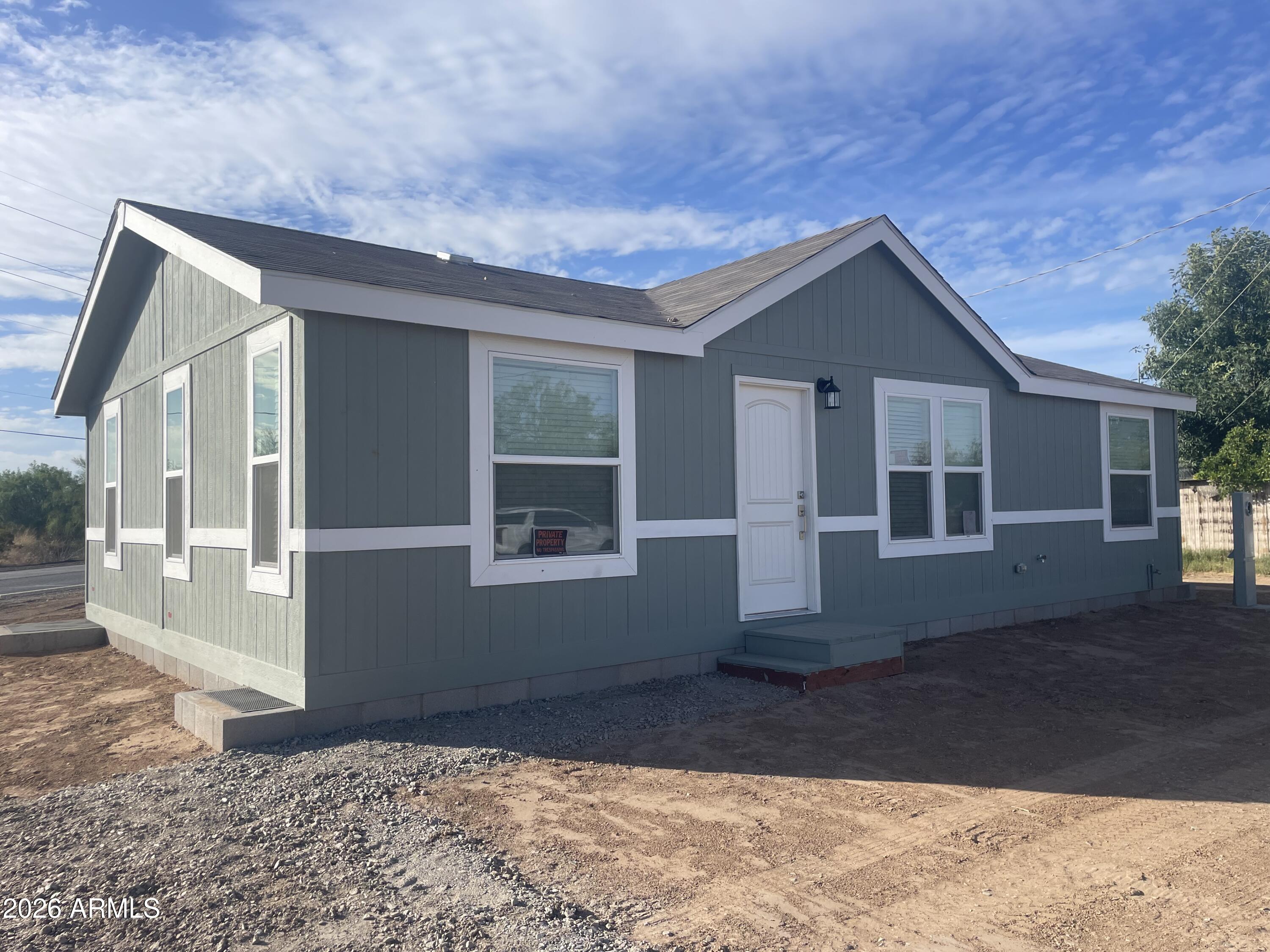 Another Beautiful Cavco Home! 3 bed 2 Bath with tons of upgrades to Cabinetry, Flooring and Appliances. This New Home sits on a NO HOA lot in the heart of Wittmann near Stores, Schools, Post Office, Parks and Eateries. This Cozy home comes with Builders Warranty !! Fencing is also included. Builder incentives includes Buyers Closing Cost.