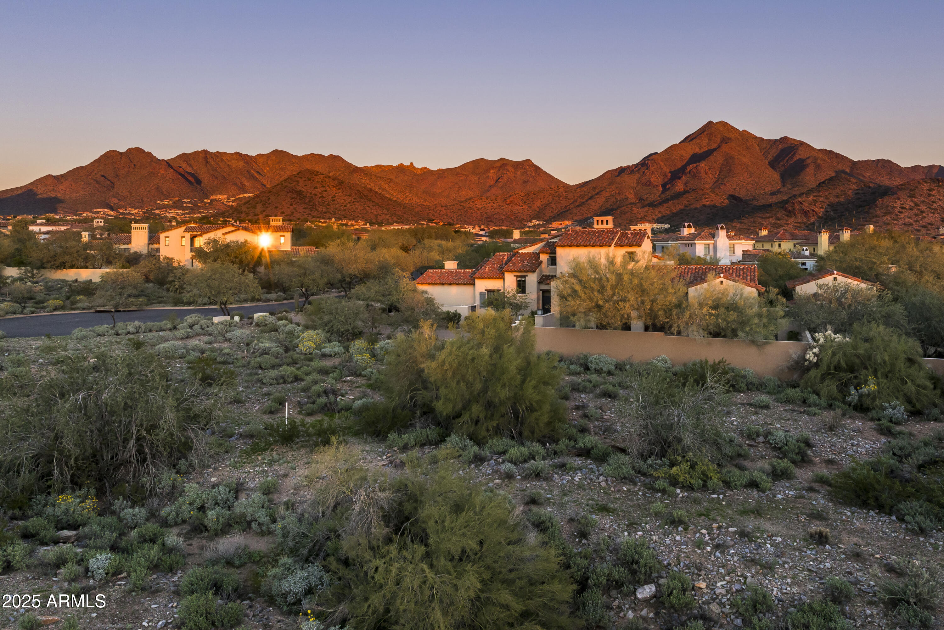 Custom Homesite in Silverleaf - Horseshoe Canyon
Homesite Lot 3220 is a rare opportunity to build within the prestigious, guard-gated Horseshoe Canyon enclave of Silverleaf. Ideally located just blocks from the Silverleaf Club and Spa, this homesite also offers convenient access to the Village Health Club and retail and dining. 

Set on a quiet cul-de-sac, the approximately 0.77-acre lot features a level 16,573 highly usable building envelope with no required desert preserve or NAOS, allowing the entire homesite to be developed. The property captures desirable city light views to the south and mountain views to the east, providing an exceptional setting for a custom residence in one of North Scottsdale's most sought-after communities. Silverleaf, located in North Scottsdale, Arizona, is a prestigious guard gated community known for its luxurious estates, exclusive golf courses, private Club and stunning desert landscapes. The Tom Weiskopf-designed Silverleaf Golf Course is a highlight for golf enthusiasts. With a blend of Spanish and Mediterranean-inspired architecture, the community offers a high standard of living, including upscale amenities like spas, fine dining, and exclusive shopping. Residents enjoy a harmonious balance between modern luxury and the natural beauty of the desert environment, making Silverleaf a sought-after destination for those seeking an exceptional lifestyle in North Scottsdale.