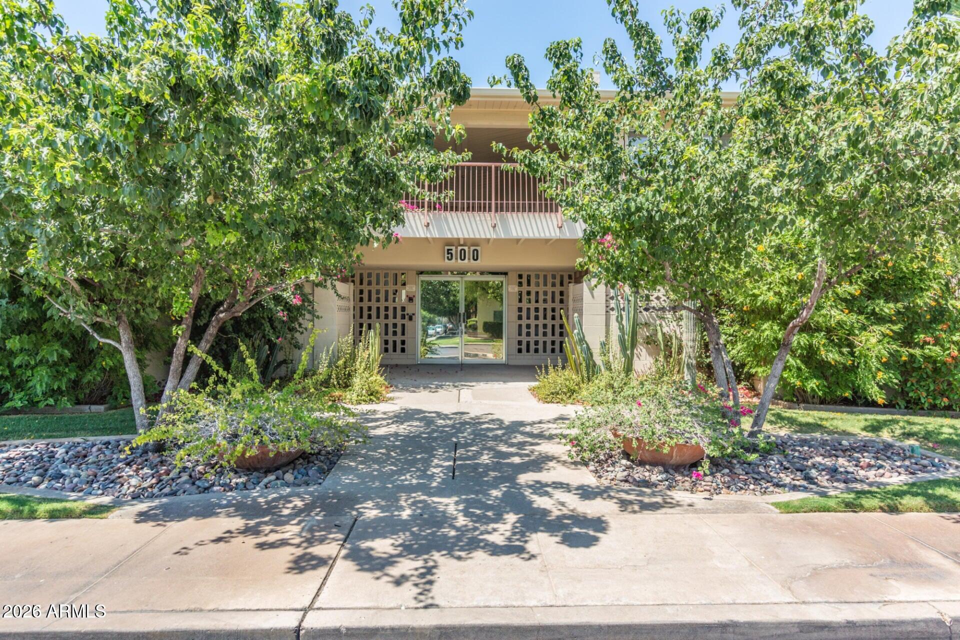 Twice chosen for the Midtown Urban Living Tour, because people want to see stunning desirable spaces.  All the things you love in one space. This is THE address & out the door is The Clarendon, Park Central & the light rail that drops you at every concert & event downtown, airport & more. Rebuilt w/exceptional taste. Kitchen: quartz, white cabinets, crown molding, tile ceilings & sink views to the back courtyard, ss appliances & gas stove. Cozy living that envelopes you into the space w/linear fireplace. Bar beneath the stairs. Even the laundry rm. is stunning w/sink, marble & bead-board.  Primary suite: walk-in shower, dual sinks, walk-in closet & covered balcony for sunrise gazing. Coffee bar wi/fridge in 3bd. Office at the landing w/storage.  SEE THE UPGRADES LIST.  IT'S PERFECT