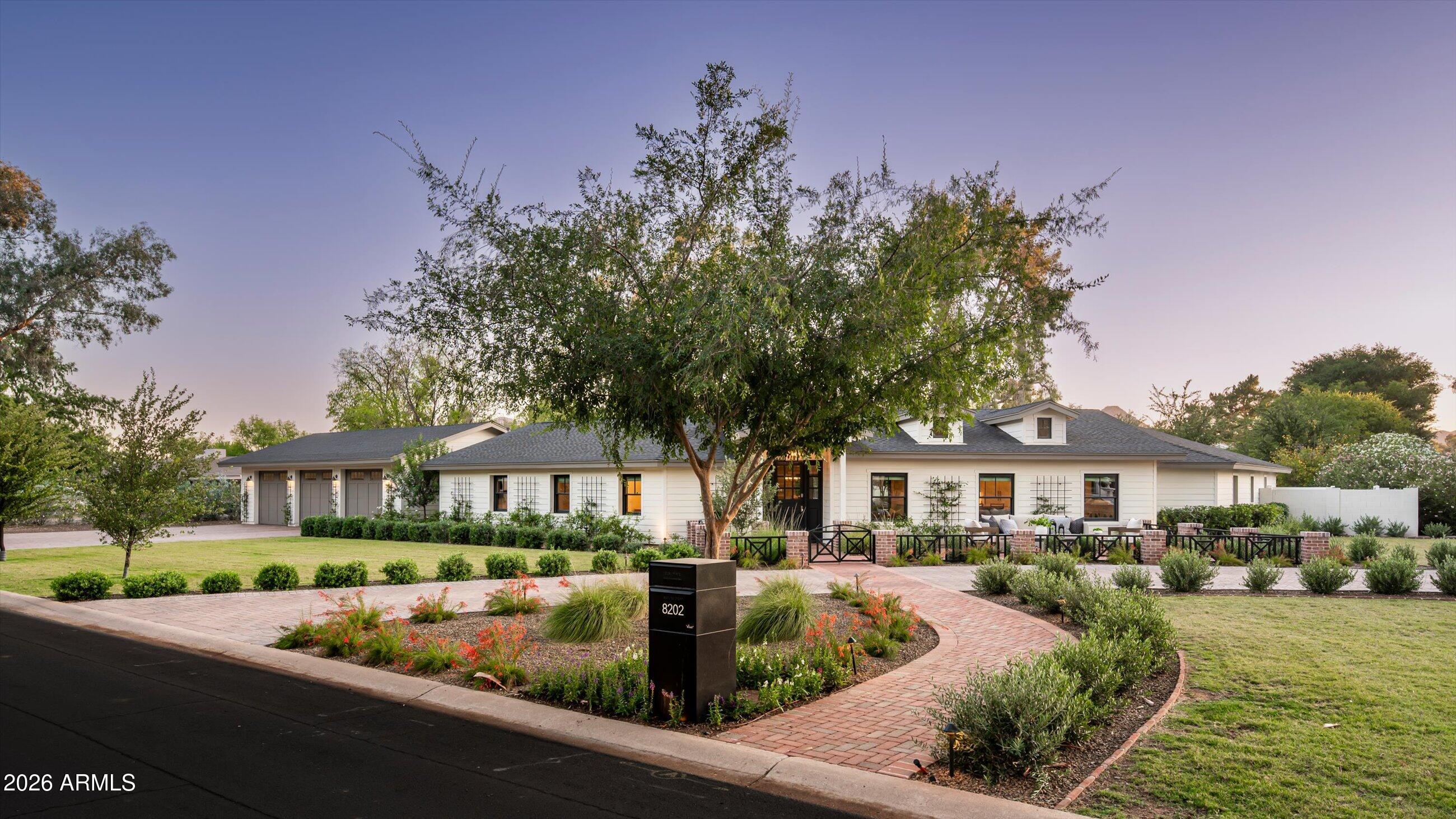 A rare opportunity to own one of Paradise Valley Farms' most complete lifestyle properties--where luxury living, recreation, and guest accommodations come together on a private 1+ acre corner lot. The property is designed for the way today's buyers want to live and entertain. 3 C's!
The 4,000+ -square-foot main residence features four en-suite bedrooms, a dedicated office with custom built-ins, walk-in closet and adjacent to a full bathroom; Office could be used as the 5th ensuite bedroom in the main house. The great room, kitchen and dining rooms have 16'+ vaulted ceilings, wide-plank hardwood flooring, and wall of glass that creates a seamless connection to the outdoor living spaces. The open-concept floor plan is filled with natural light and anchored by a beautifully appointed kitchen featuring custom cabinetry, premium finishes, and generous gathering spaces.

Beyond the main home, a fully detached guest house provides exceptional flexibility for extended family, visitors, multigenerational living, or a private retreat. Together, the property comfortably accommodates large gatherings while maintaining privacy and comfort.

The backyard delivers the lifestyle buyers are actively seeking, with a full pickleball and sport court, expansive covered patios, manicured grounds, and multiple spaces for dining, entertaining, and relaxation. A versatile bonus room adjacent to the three-car garage is currently configured as a private fitness studio, complete with glass doors opening directly to the backyard, creating an ideal indoor-outdoor wellness space.

Few properties offer this level of functionality, privacy, and recreation on a full acre in one of Scottsdale's most desirable neighborhoods.

With no HOA, the sky is the limit for someone who wants to expand the footprint to make it fit their needs.
