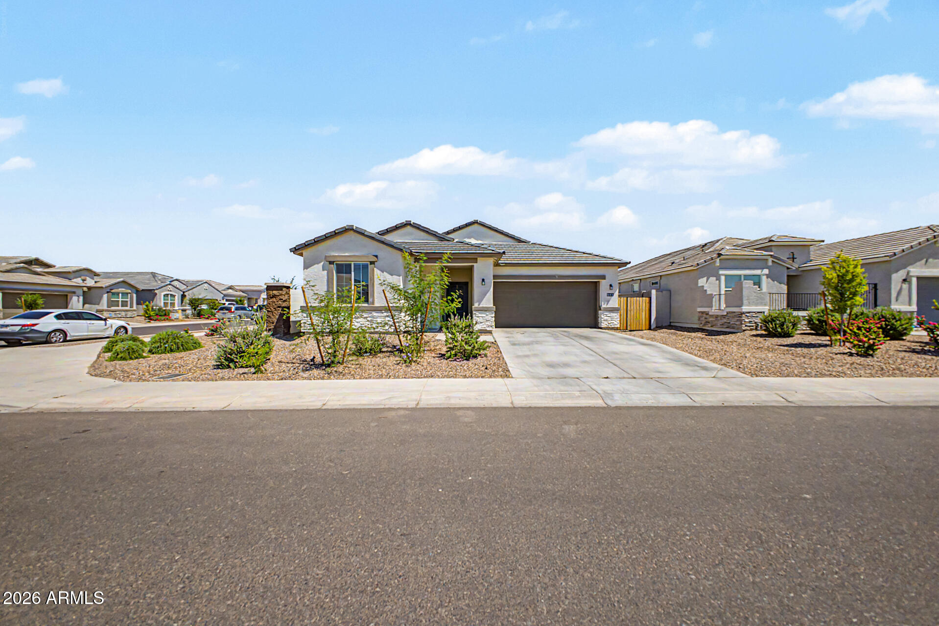 Home, sweet home! Located in Trouvaille, this charming single-level residence awaits you. Nestled on a corner lot, it offers 4 beds, 2 baths, and a 2-car garage. Enter to find inviting living spaces, paired with tile flooring and tons of natural light. The kitchen boasts built-in appliances, a pantry, granite counters, a center island, and cabinetry for ample storage. Split bedroom floor plan for added privacy! The main bedroom has an ensuite with dual sinks. Washer & dryer included! Out the back, you have a patio slab  to relax or enjoy BBQ. Don't miss this gem!