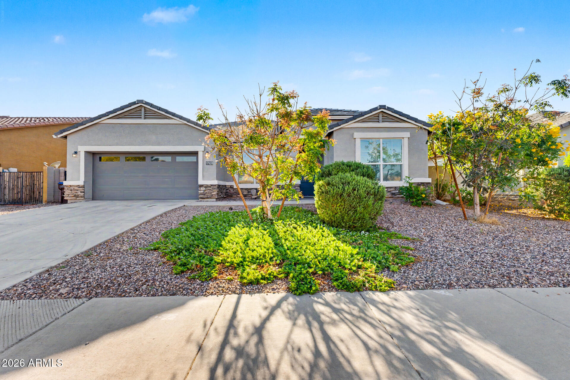 Welcome to this spacious 4 year old D.R. Horton ''Smart Home'' in popular Palo Brea community offering several green areas and playgrounds within only a block or two. Also is located very near Coppersky park. School busses stop right on the street! The ''Smart Home'' allows you to control all interior devices from one central location plus the A.C. is zoned for energy efficiency. This all electric home is safe and offers clean energy.

The exterior features a modern design with a sleek facade; interior an open floor plan. First, welcome to the spacious Bonus Room, perfect for a home office, playroom or den. Formal dining room and huge family area open to the kitchen. Kitchen features all electric appliances, a huge breakfast bar, Quartz countertops, ample cabinets plus a walk-in pantry and a breakfast nook for informal meals.

The Four (4) bedrooms are spacious and three (3) full baths offering plenty of natural light, creating a cozy and inviting atmosphere. The bathrooms are elegantly designed. Master suite offers a walk-in shower, double sink vanity and walk-in closet.

The backyard is a private oasis! In-ground Pool with terrazo coping and patio, perfect for enjoying the Arizona weather. Whether you're looking to relax on the patio or entertain friends and family, this outdoor space has it all. A covered patio, open patio and small pergola. A pool security fence to keep little ones safe is easily removed if unneeded. Low maintenance artificial turf in back yard.

Located in a desirable neighborhood, this home offers a perfect blend of comfort and style. Don't miss the opportunity to make this your dream home!.