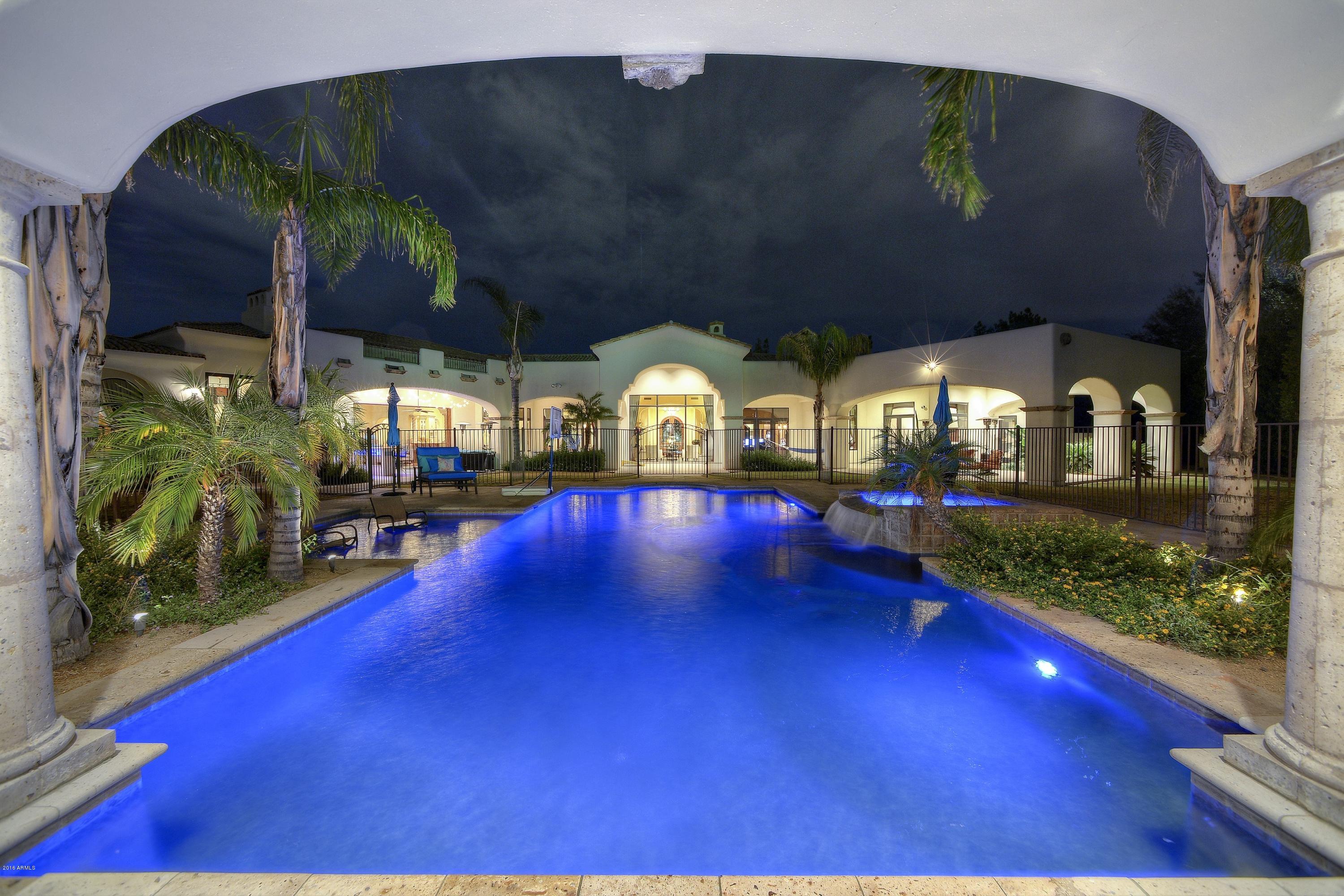 YOU READY FOR THIS? The former residence of NBA/ NFL Hall of Famers- Shaquille O'Neal & Emmitt Smith, built BY & FOR the Geitz Master Builder himself, is back up for grabs! This meticulously designed/ artfully crafted Masterpiece, & the EPITOME of the AZ lifestyle is a perfect marriage of tranquil sanctuary & urban accessibility. Privately gated & surrounded by a screen of mature pines, w/ panoramic views of the legendary Camelback Mtn, the sprawling Mediterranean/ Santa Barbara inspired property (on just shy of 2 acres) is tucked quietly away, yet just a quick jaunt from all of the HOTTEST establishments of surrounding PV/ Scottsdale. Featuring all amenities & conveniences you'd expect, w/ countless architectural custom details FAR beyond, this showhome is nothing short of EXQUISITE!