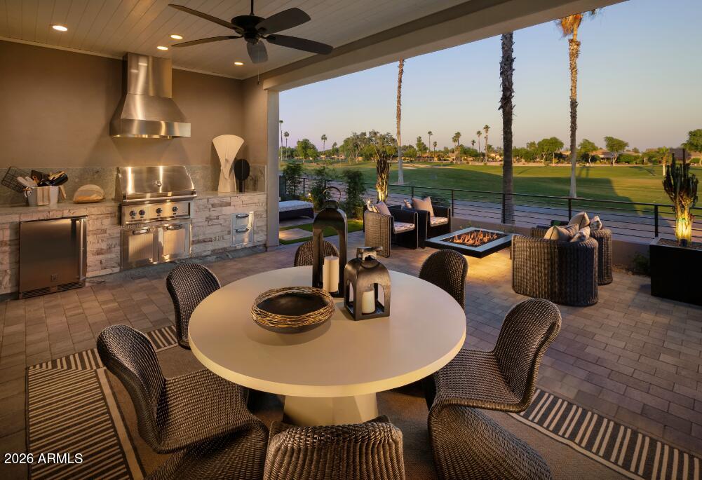 PebbleCreek Special Luxury Golf Villa Showcase Home with contemporary exteriors and feature rich interiors. Buy furnished or unfurnished. The 3,675 sq ft. 3 bed, 3 bath, 2 powder rooms Loma Plan is a two-story Entertainers dream home! First floor offers amazing designer indoor and outdoor kitchens, great room, primary bedroom, 2nd bedroom suite and den.  A private elevator to the 2nd level opens to a 3rd bedroom suite, office, bonus room and outdoor living space with prime golf course views. Special features include stackable moving glass walls to outdoor living space on both levels, all custom landscaping, window coverings, Signature wine center at 1st floor bar, Zephyr Kegerator at 2nd floor bonus room bar, enclosed courtyard w/ gate, Walk to the community center, clubhouse and More! The award winning PebbleCreek Resort Community has 3 Championship Golf courses, 36 Pickleball courts, Indoor/outdoor pools, fitness & art centers, 100's of social clubs & more!
 Ask about the high-quality energy standards. 
Luxury Golf Villa Standards include:
*Primary bedroom has large walk-in closet.
*Large kitchen pantry
SEE INCLUDED FEATURES SHEET IN PHOTOS! 


Kitchen:
" Newport HDF - Dove White
" Quartz Countertops
" Full Height Tile Backsplash
" Blanco Granite undermount single bowl sink - White
" Delta Trinsic pull-down faucet - Matte Black
" LG Signature Series 42" built in side-by-side refrigerator - Stainless Steel
" LG Signature Kitchen Suite Appliance package - 36" Gas Pro Cooktop with 6 burners,
Top Control Dishwasher, 30" Combination Wall Oven with Speed Cook and Steam,
Signature Chimney Hood
Bathrooms:
" Quartz Countertops
" Kohler Cimarron Comfort Height toilets - White
" Kohler Ladena rectangular undermount sinks - White
" Delta Saylor fixtures - Champagne Bronze
Additional Upgrades:
" Elevator package
" Office with covered deck at second floor (standard den on first floor)
" Additional Laundry room with granite countertops, stacked washer/electric dryer 2nd floor
" Window Coverings throughout
" Alterra electrical/home technology/media options
" Crown moulding and custom paint - selected rooms
" Coffered ceiling at Primary bedroom and Den
" Signature Wine center at first floor bar- Stainless Steel
" Zephyr Kegerator at second floor bonus room bar - Stainless steel
" Kohler Undertone entertainment sink at second floor bonus room
" First floor laundry room - LG top load washer /electric dryer package - Graphite Steel
" Upgraded decorative lighting and fans throughout
" Upgraded carpet, luxury plank vinyl and porcelain tile
" Stackable Moving Glass Wall Systems on both levels
" Epoxy floor coating at garage
" Rear courtyard custom landscaping
" Outdoor Kitchen Package