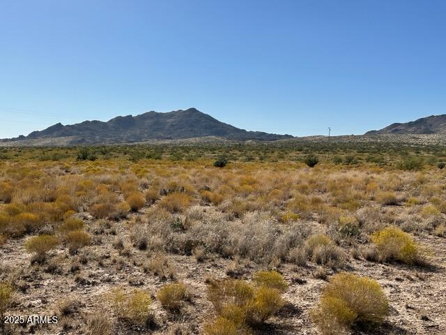 Seller Financing Available! Lot 50B (12.1 acres) in Saddle Creek Ranch Phase III bordering Arizona State Trust land at your backdoor! Located between Wickenburg and Prescott, this stunning Arizona land, offers an unmatched quality of life with good abundant ground water per subdivision developer. Embraced in the foothills of the Weaver Mountains and along Sunflower Flats at a 3,400 elevation. Roads in the subdivision are maintained by the property owner association. Date Creek Road is maintained by the County. Power runs along the property on Traveler Way. Additional parcels are for sale. Arizona is the 6th largest state in size. However, the largest segments of Arizona's land belong to the federal, state government and the Native American tribes leaving only 17% of Arizona land held..... privately. Terms are 10% down payment, 4-year note amortized over 20 years, monthly payment at 7% interest, balloon payment due at the end of the 4th year, no pre-payment penalty! Buyer pays for account servicing set up and monthly service fee, all other closing costs are normal. Property is part of 202-18-001A. Buyer acknowledges Yavapai County has not assigned a physical address or APN. These are to be assigned by Yavapai County, post-closing. Legal description will be recorded at close of escrow. Buyer to verify availability of utilities, water availability, building codes & supporting documents. See docs tab.
