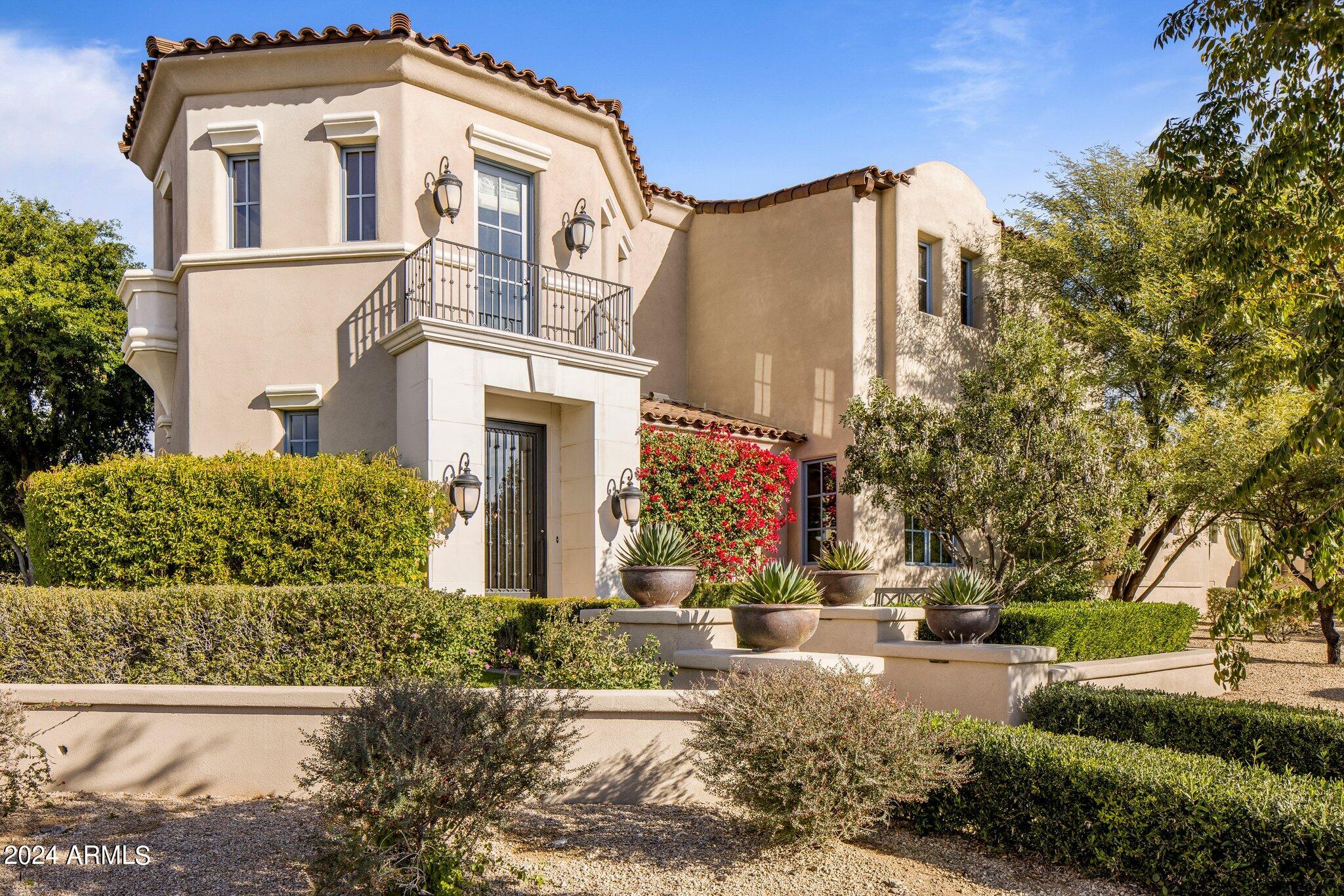 Welcome to this highly energy efficient family home in the gated tree-lined streets of Arcadia at Silverleaf, ideally located in North Scottsdale close to Scottsdale Airpark, HWY 101, and DC Ranch Market Street. This expansive and open floor plan features main living on the first floor. The chef's kitchen features a large granite island with sit up seating, walk-in pantry, Wolf/Subzero appliances and overlooking the family room with masonry fireplace and outdoor patio access. Enjoy hosting in the spacious formal dining room w/ dry bar, wine fridge, and separate seating area. The primary suite is on a wing of its own with a fireplace, reading nook, pool access, his/hers closets, standing tub and walk-in shower. A large en-suite guest bedroom or office (click ''more'' to continue reading).. with a private patio rounds out the first floor. Three en-suite guest bedrooms are on the second floor enveloping a large flex space with wet bar (sink & fridge) and multiple patios that take advantage of beautiful city light and mountain vistas! Guests will enjoy privacy in the detached casita with kitchenette and separate entrance. Outdoor entertaining is a joy in the backyard with a covered dining area, built-in BBQ, lush landscaping and plenty of grassy areas for kids and pets to play. Newer HVAC units, fully owned 22kw solar array, and whole house tankless water heater make this home highly energy efficient, along with a 72 amp high powered Tesla charger. Don't miss this beautiful interior corner lot estate in the prestigious Silverleaf at DC Ranch with community features including heated pool, tennis courts, workout facility, and numerous biking / walking / hiking trails!