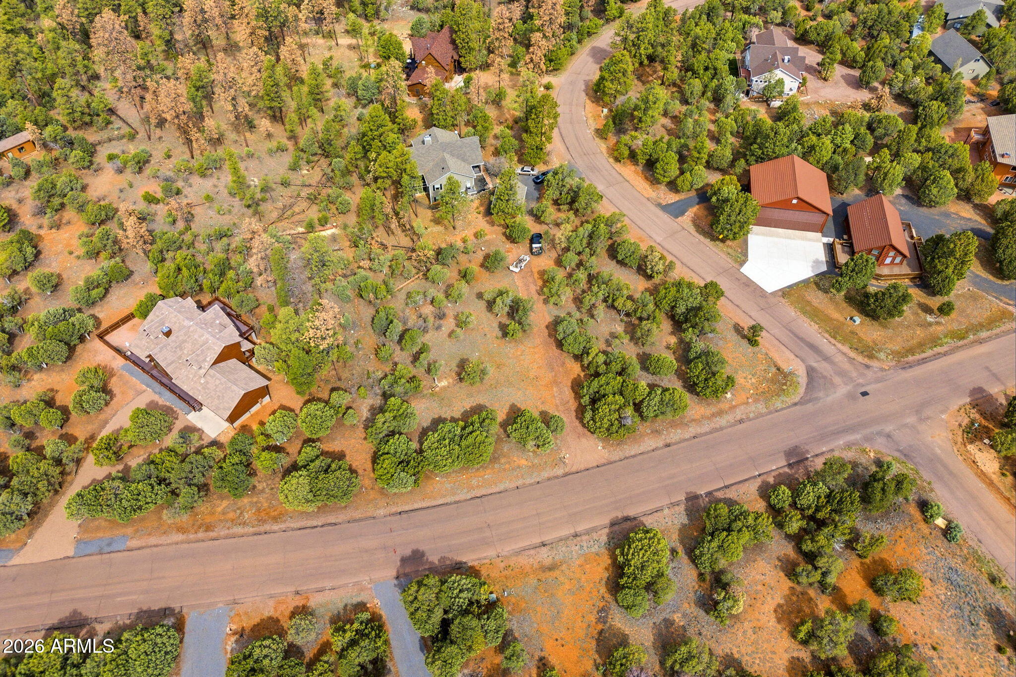 This beautifully cared-for offering presents a rare opportunity to own in the prestigious Mogollon Airpark. The property includes a prime residential lot at 2824 Constellation Lane (APN 206-29-224, 0.793 acres) along with a nearby hangar lot (APN 206-29-529, 0.102 acres) featuring direct taxiway access--ideal for aviation enthusiasts seeking both convenience and lifestyle.

The residential parcel spans 34,556 square feet and includes a septic system, while the 4,437-square-foot hangar lot provides the perfect footprint for your aviation needs. Utilities, including water and power, are available at the lot line. The property offers a generous, buildable area for your custom home and hangar, all surrounded by the natural beauty of mature Ponderosa Pines, Juniper, and Piñon trees. The seller also owns the adjacent homestead at 2832 Lazy Eight Court (APN 206-46-019) and would prefer to sell all three parcels together, presenting a unique opportunity for an expanded estate or private retreat.

Mogollon Airpark (AZ82) is a vibrant, private aviation community featuring a 3,436-foot asphalt runway and a welcoming, social atmosphere. Residents enjoy community events such as BBQs, happy hours, and breakfast fly-ins, along with amenities including basketball and pickleball courts.

Located in Heber-Overgaard at a refreshing elevation of 6,658 feet--just 90 nautical miles northeast of Phoenix--this area offers mild summers, crisp winters, and endless outdoor recreation. With ATV-friendly terrain, scenic forest roads, and multiple lakes for fishing all within 30 minutes, adventure and relaxation are always within reach.