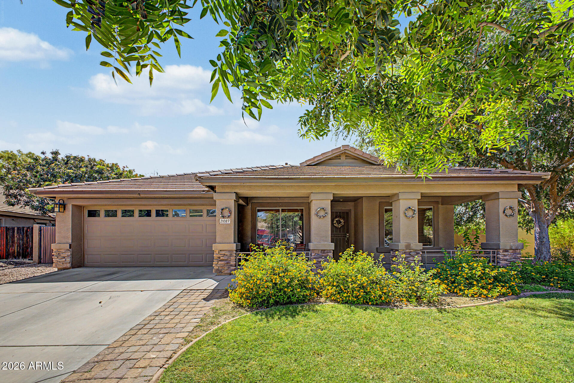 Experience ultimate luxury and efficiency on one of the largest premium lots in the Villages at Queen Creek. This move-in-ready gem features a new roof, fresh interior paint, newer AC, paired with solar panels that result in virtually no electric bill! Enjoy total privacy backing to common area, where you can take in spectacular sunset views from your garden spa and pool. RV gate for convenient storage. Inside, open floor plan boasts gourmet kitchen with double ovens, large butcher block island with breakfast bar and pantry, family room and living room, and a private primary suite with dual sinks, walk-in closet and three other bedrooms. Spacious and comfortable.  The Villages Community offers amenities such as golf, tennis, fitness center, and community pool. What more could you ask for? This home has transferable warranties on the AC and roof and the solar has a low balance left.