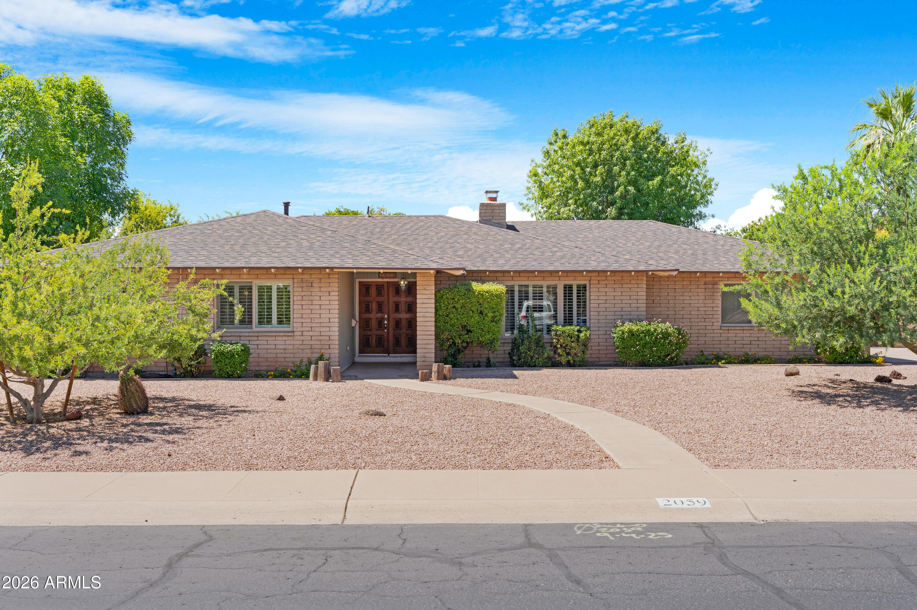 Homes in this subdivision are few and far between. Located in a mature neighborhood in the heart of Tempe, this 4-bedroom features a private pool on a spacious 12,650sf lot! This beloved family home includes a pool, large backyard, new roof, new vinyl flooring, and a new water heater. It is well-situated with a friendly and open layout. Previous owner was a master gardener;  as a result, the soil on east side is very fertile. Don't overlook the orange tree! 
With No HOA, block construction, bonus storage room off garage, a laundry room between the garage and kitchen, and gas appliances these are just a few of the things that make this home a standout in an already highly sought-after area.
