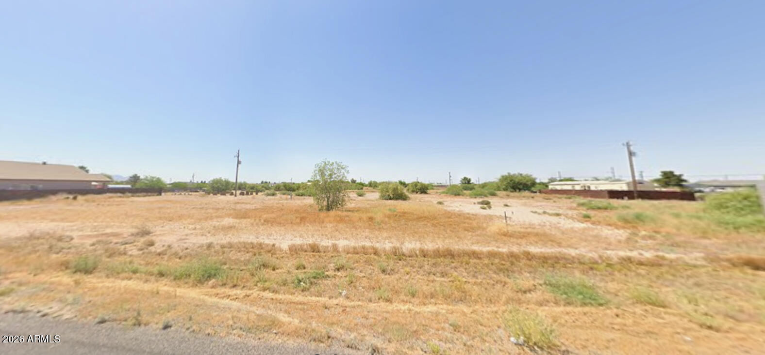 RARE TRIPLE SIZED LOT - keep together or split, all up to you. NO HOA! Well located, only about 10min to Casa Grande. Build your modern site-built home or even a high-quality manufactured home, this oversized level lot is versatile ready for your vision! Water and electric are already to the property line, septic for sewgae. saving you a bunch of time and money. This lot is centrally located in a rapidly developing area.