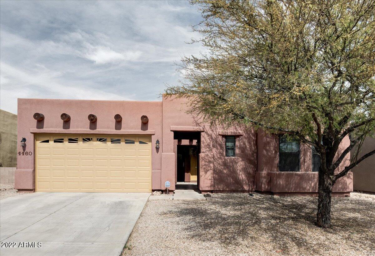 THE SEARCH IS OVER!  This lovely, three bedroom with optional 4th bedroom has all you need to live life to the fullest. Beautiful kitchen with granite countertops, 42'' cabinets for extra storage, gas stove and range top. Gorgeous wood-grain tile throughout for style and ease of cleaning.  2.5 baths and covered patio.  This neighborhood has charming Santa Fe style, in near proximity to public library and police station, and  located close to all downtown shopping!