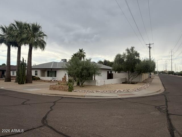 Nestled in the heart of Scottsdale's Village Grove Historic District, this Mid-Century corner lot gem has been waiting for you.  The pool size backyard features a covered deck, mature landscape and an RV gate. Low traffic, quite street.  Easy access to miles of canal walking/biking trails, hiking & golf, you'll enjoy the best of outdoor living right at your doorstep. Ideally located just minutes from iconic Old Town Scottsdale, fine dining, shopping, galleries, Spring training, entertainment, freeways, airport & more, offering the ultimate in convenience.