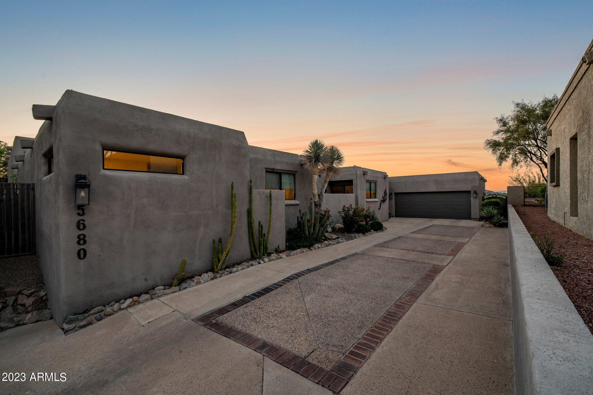 Welcome to your own private oasis in Echo Canyon with stunning views of the Praying Monk and sunsets over the city, offering the perfect balance of tranquillity and convenience. This guard-gated home is nestled in a quiet cul-de-sac offering unparalleled privacy and breathtaking views. Step inside this recently updated 5,056 sq ft detached home and immediately be impressed by the 16 feet of moving glass doors leading to your private patio, providing the perfect setting for entertaining guests. With 4 bedrooms and 3.5 baths, including an enormous primary suite with three closets, this home is perfect for families or those who desire a spacious and luxurious living experience. Enjoy private access to Echo Trailhead and some of the best views in the city right from your backyard. In addition to the stunning views and incredible location, this meticulously cared for home also boasts community amenities such as a heated pool and spa, and tennis courts.