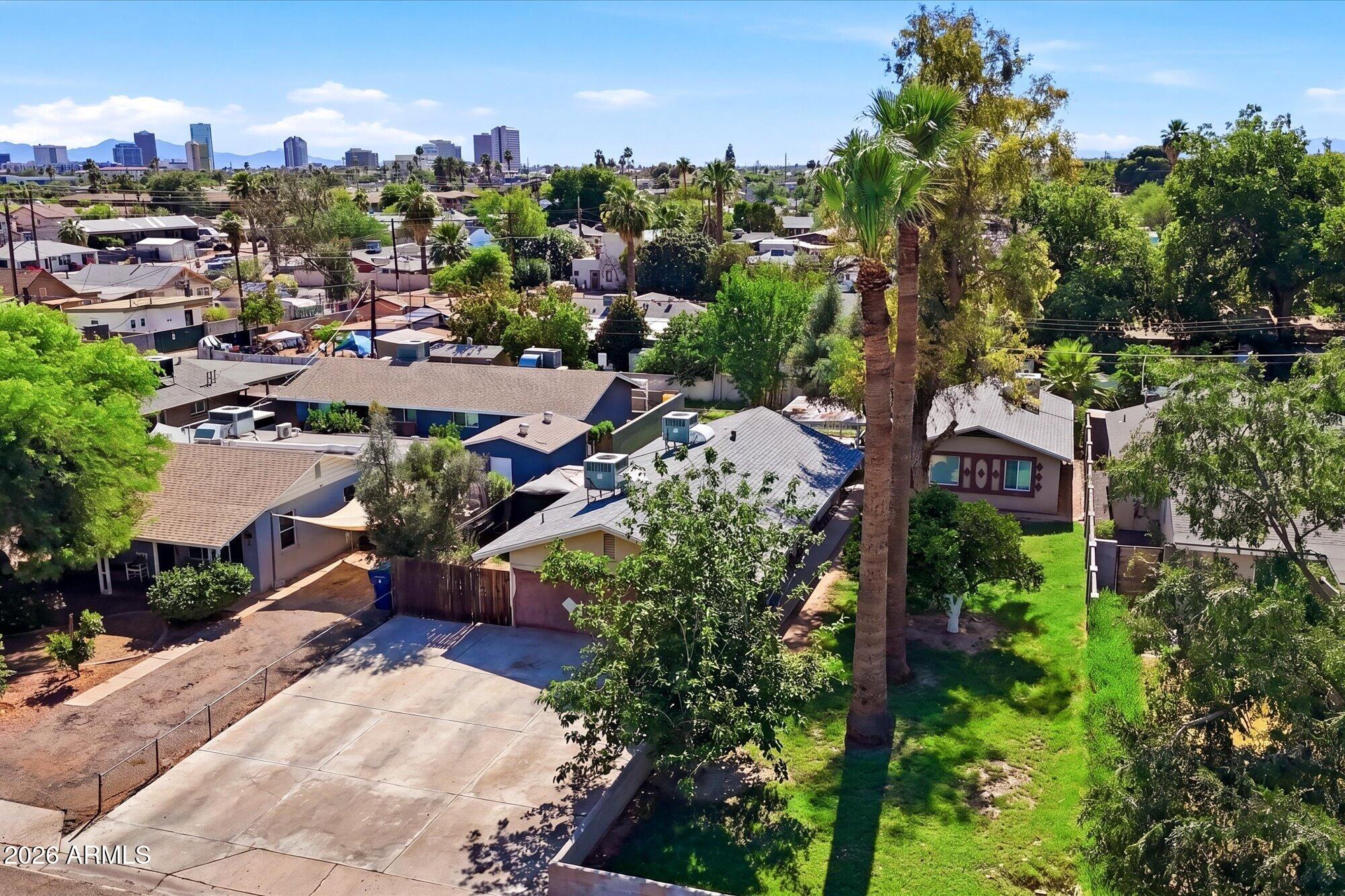 Prime Phoenix multifamily in the Biltmore Area submarket--this fully occupied 3-unit property (2×1-bedroom units + 1×2-bedroom unit) offers strong curb appeal, a quiet neighborhood feel, and immediate rental demand. Conveniently located ½ mile from AZ-51, with easy access to major employment and healthcare anchors including Phoenix Children's Hospital and Phoenix Indian Medical Center.
Each apartment features its own private yard space, plus open parking and inviting outdoor surroundings with green lawns and mature palms. The property benefits from new roofing and new water heaters, supporting lower near-term capital needs and smoother operations.
Surrounded by shopping, dining, schools, parks, hospitals, and mountain access, this location supports tenant retention and high rent-demand.