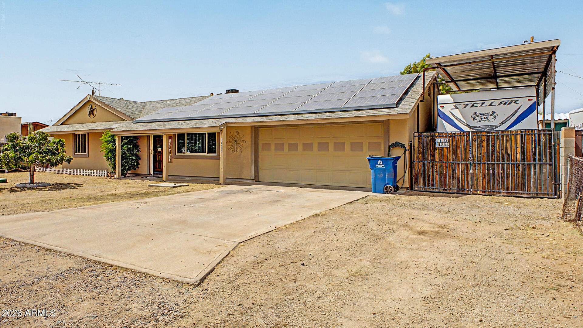 Welcome to this charming home in Sundown! This energy-efficient, 3-bedroom residence is on a spacious cul-de-sac lot, featuring an attached garage, RV gate, and a generous front yard. Step inside to a bright, open layout complemented by warm-toned paint and Saltillo tile flooring. The galley kitchen is equipped with ample storage, stainless steel appliances, and granite countertops. The primary bedroom offers a full bathroom for added privacy & comfort. The backyard oasis has a covered patio and a sparkling pool with a seating area around the edge for sunbathing. This wonderful home has it all, yet provides an opportunity to add your personal touch! Enjoy a quiet neighborhood with fabulous views of Superstition Mountain and vibrant, colorful sunsets. Don't miss this amazing property!