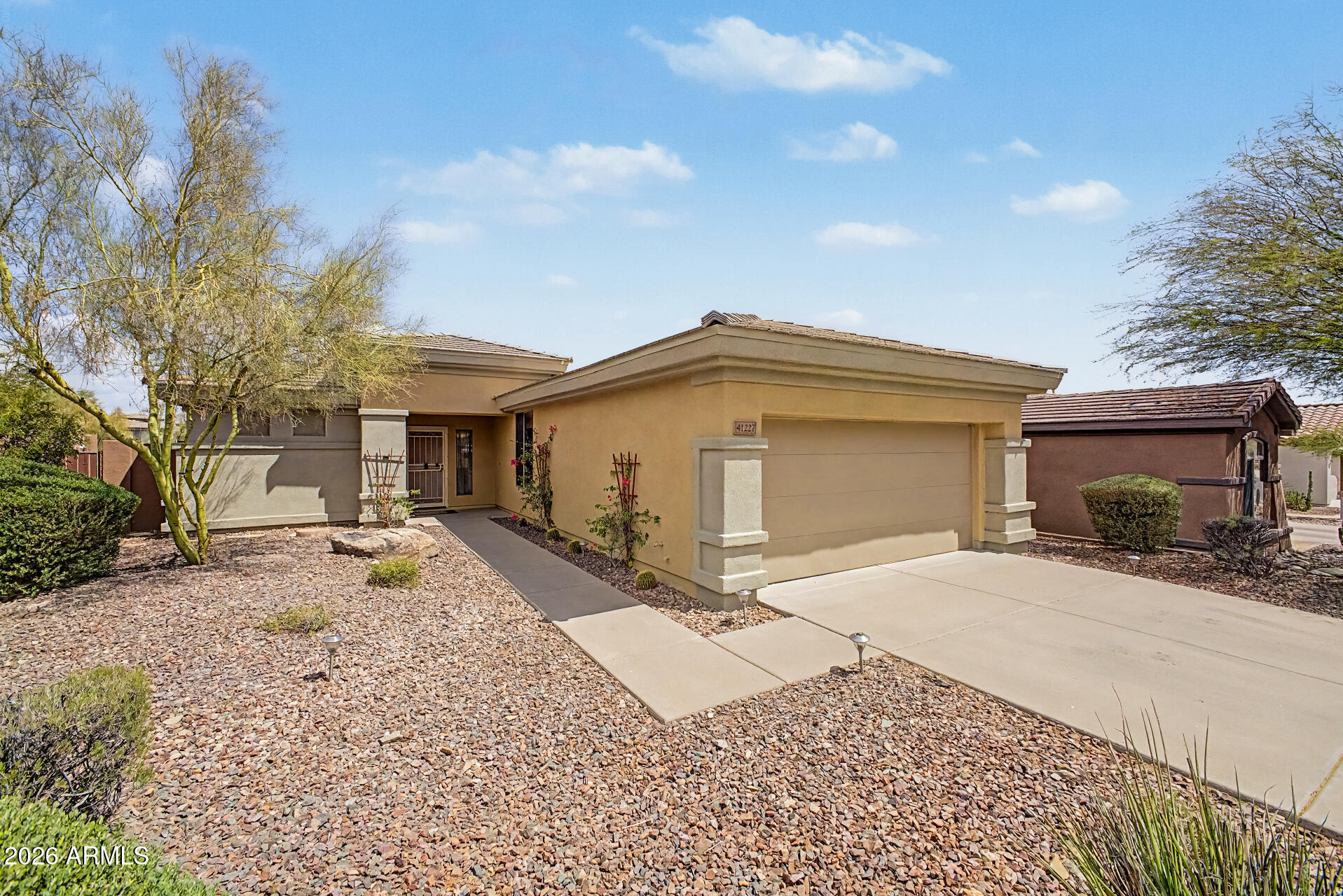 New price!! Welcome to this stunning Dover Expanded floor plan located in the prestigious Anthem Country Club! This well maintained 2 bd, 2 ba residence offers a spacious and open great room, perfect for entertaining and everyday living. The expanded layout enhances the flow of the home, creating a bright and inviting atmosphere. Backyard backs to open space and is ready for your personal touch. Enjoy access to the world-class amenities including championship golf courses, state-of-the-art fitness centers, resort style pools, tennis courts, dining, all within a secure, gated community. Also included is Parkside's pickleball courts, community center, and water park. A beautiful community to fit any lifestyle.