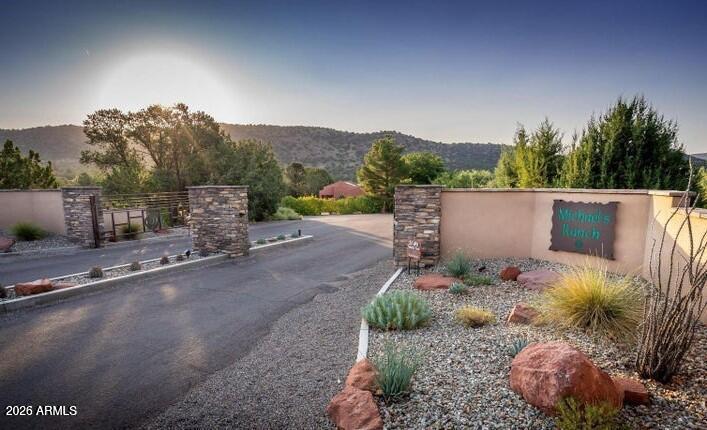 Rare opportunity to build your Sedona dream home on a stunning .82-acre level lot in Michaels Ranch. Gated subdivision with minimal HOA restrictions. Secluded yet convenient development borders National Forest on two sides. Enjoy easy access to horseback riding, hiking, swimming, fishing and four-wheeling down Forest Service Road 9845 to scenic Oak Creek. Create your own peaceful retreat, and be just minutes from West Sedona's amenities. Fully designed 3 bedroom home approved by the HOA. A complete geotechnical engineering study included. House and lot complete package for $695,000!!! STR friendly.