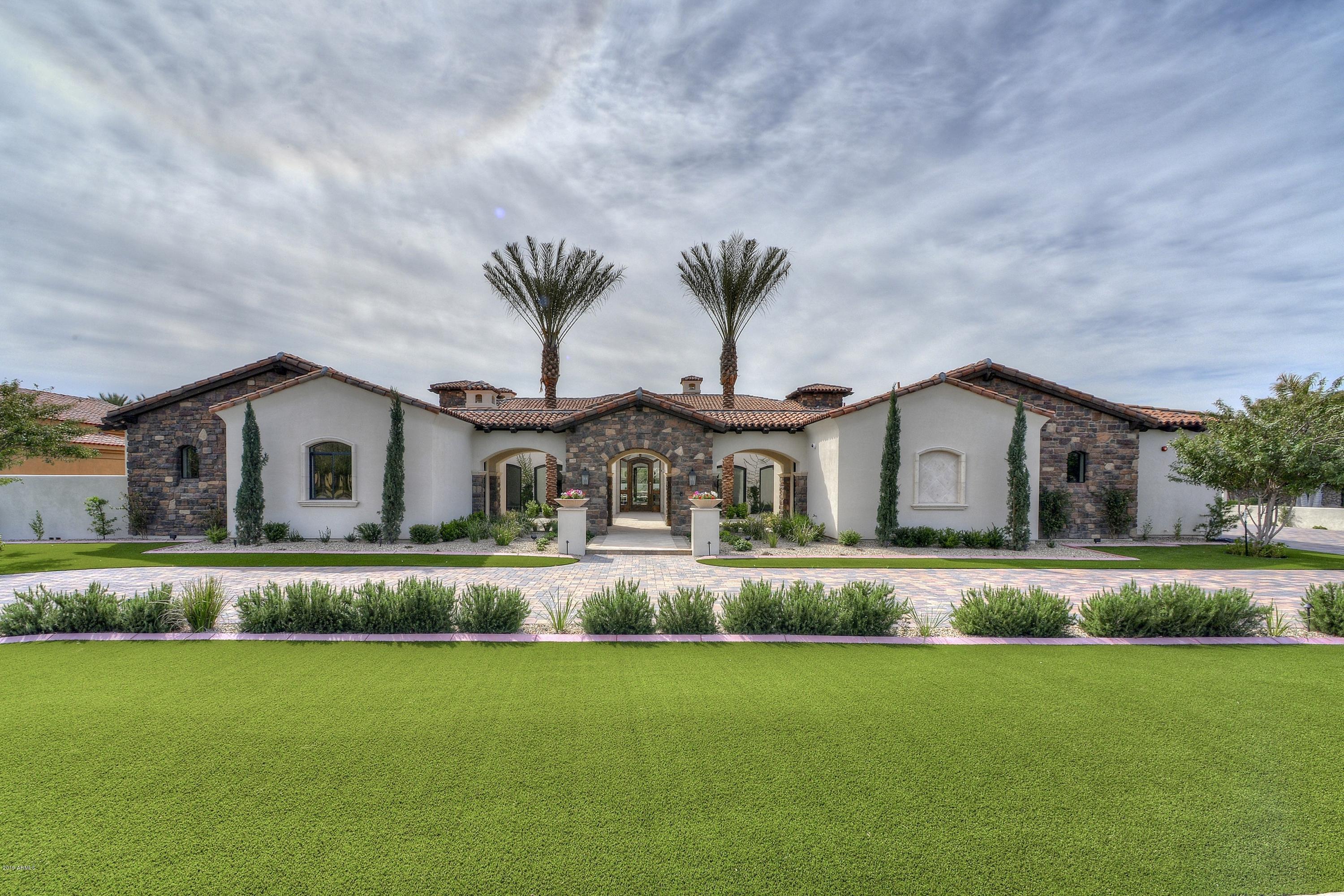 GATED***CUSTOM***NEW CONSTRUCTION***ACREAGE. 

This Estate defines Luxury, Quality, and Sophisticated features.  It is rare that a residence can capture the blend of modern architecture with soft accents that truly create timeless elegance.  This home provides space for any audience and the most discerning buyer.   Entertainment, families and most importantly the quaint feel of the gated enclave of only 17 homes.  The courtyard invites you to experience the newly finished, flagship home of 85383.  Expansive hallways, barrel ceilings with brick accents, elegant chandeliers within the vestibule invite your buyer to begin the journey of creating their own residential masterpiece.  
  
Documents tab will reflect all detailed finishes for your convenience.
