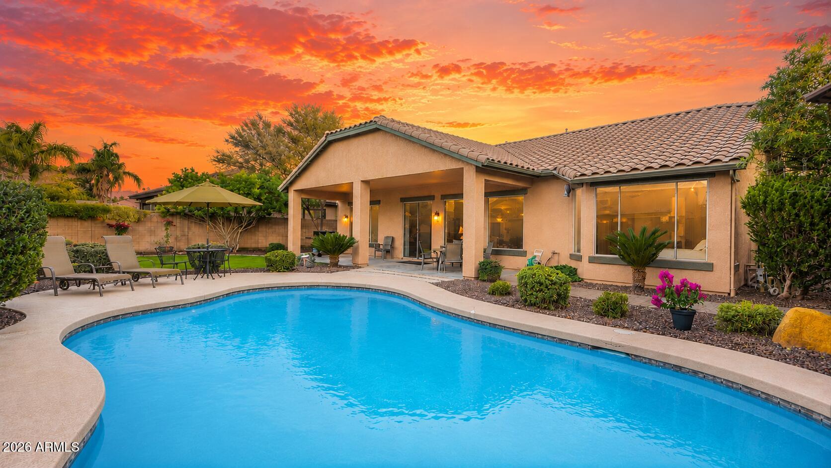 Some homes simply make life easier--and this is one of them. Set on an oversized, private lot in Seville Golf & Country Club, this single-level home offers an open layout designed for both everyday living and effortless entertaining. Enjoy three bedrooms, two baths, a flexible space perfect for a home office or reading nook, a 3-car garage, and a backyard made for Arizona living with a sparkling pool and an expansive covered patio. With no two-story homes surrounding you, privacy is a rare bonus. Optional club memberships offer golf, dining, fitness, tennis, pickleball, pools, and year-round activities just moments from home. The next chapter of your story could begin right here.