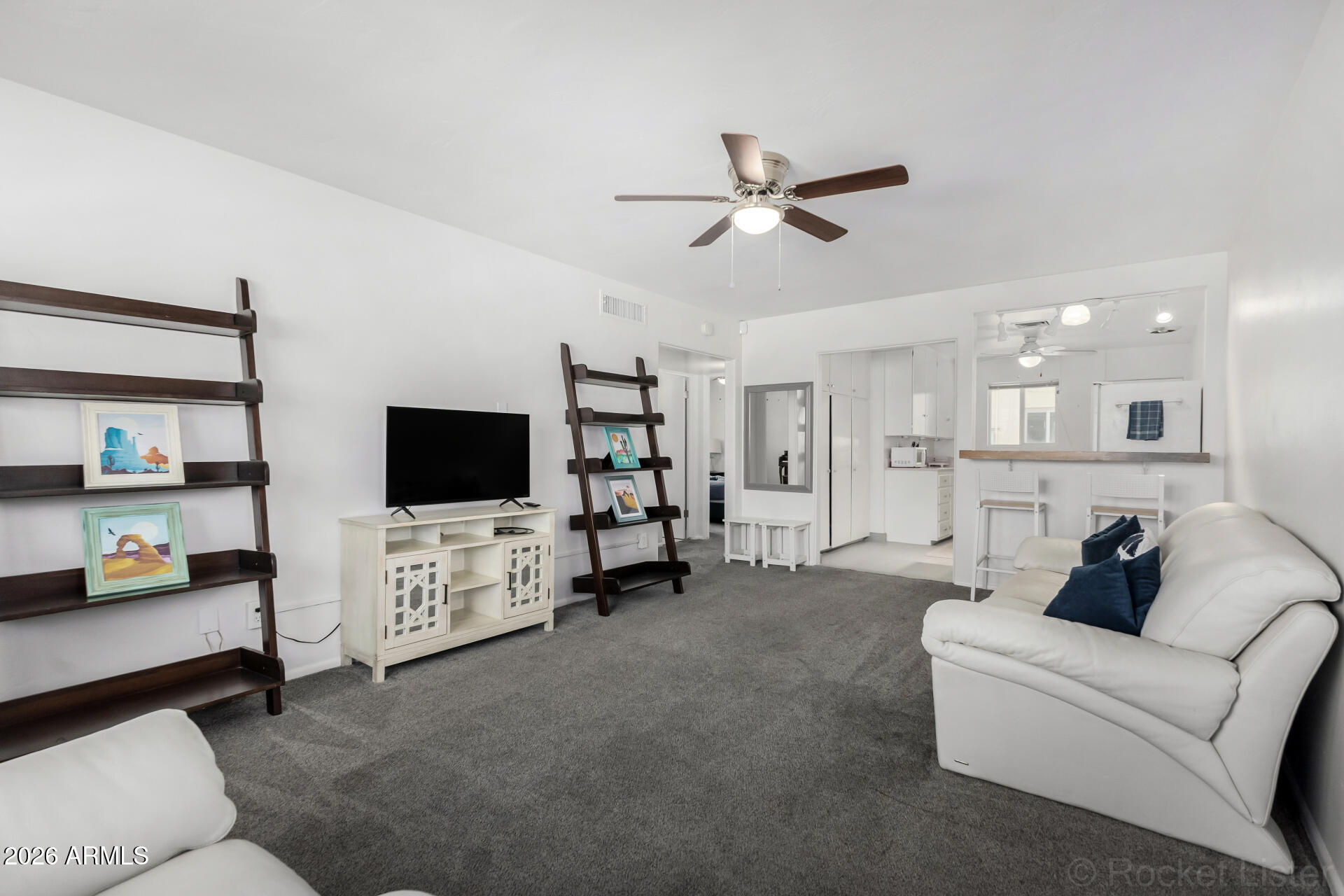 COMES TURNKEY/FULLY FURNISHED, LOW-COST CITY LIVING, ACROSS FROM ST. JOSEPH'S HOSPITAL | Clean, updated apartment-style co-op with recent renovations that make move-in simple. Updates include flooring, paint, bathrooms, water heater, and a brand new RO system. This is a strong option for buyers looking to avoid high purchase costs while still getting a comfortable, low-maintenance space in a central location. CASH ONLY co-op with no deed and a well-run board. Monthly fee covers taxes, insurance, exterior maintenance of unit, roof repair, roof replacement, blanket insurance policy, water, sewer, and garbage collection to help keep the cost of living down. Seller is also open to owner financing.