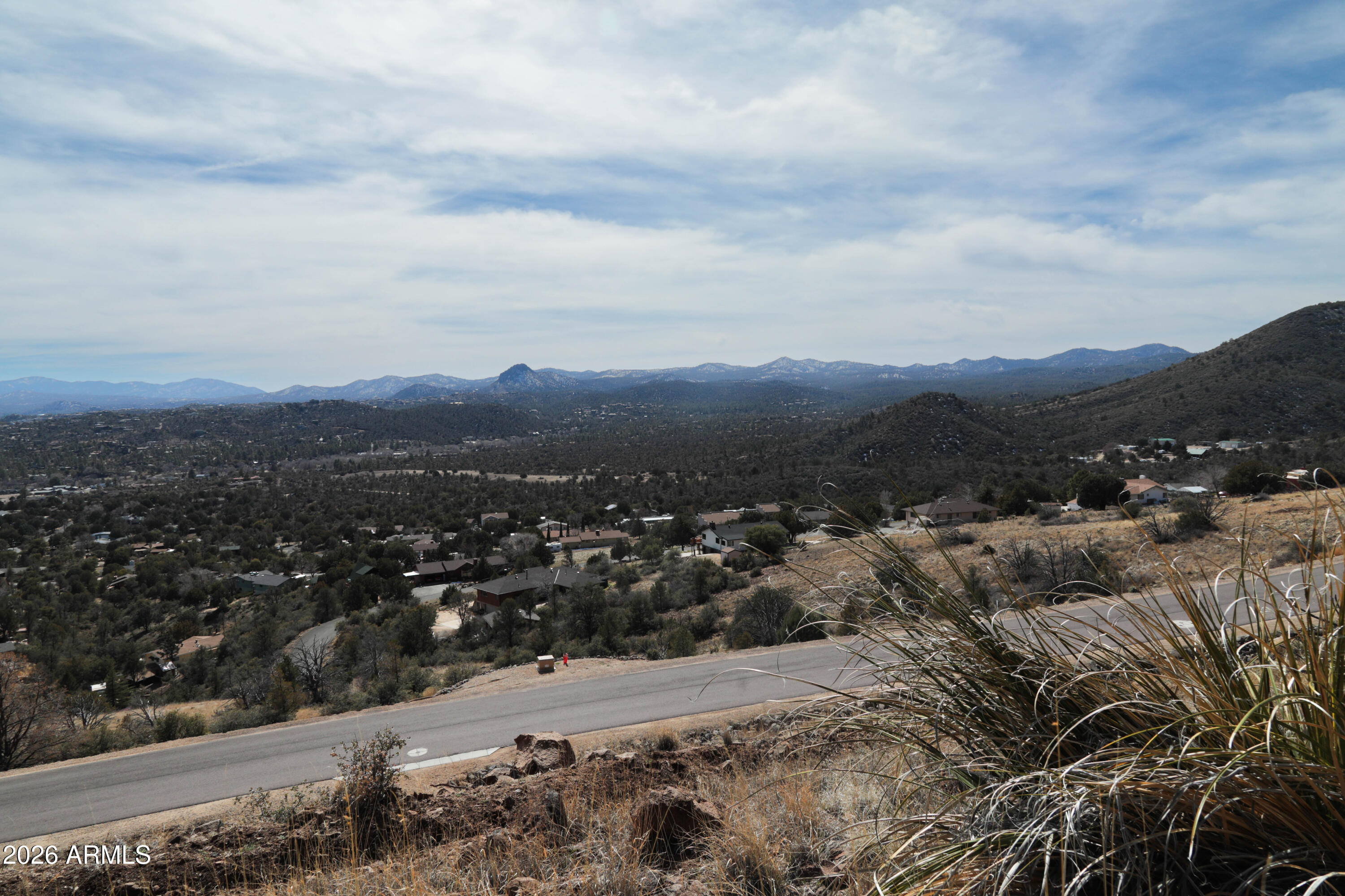 Are you looking for unbelievable views?Welcome to Stringfield Ranch at Granite Mountain, Prescott's premiere master planned community.  This lot is in Phase 1 which gives you the ultimate flexibility to build whatever you like. Both owner builds & contractor builds are allowed. This lot also allows you to build the coveted Toy Shop. Store your RV, boat, ATVs and more, right on your own land. Need a worskshop, studio, guest house or just extra storage space? Then this is your spot. Dedicated open space envelopes the lot so no neighbors behind. Build your dream surrounded by National Forest & State Land yet minutes from all amenities Prescott provides. Stringfield Ranch offers a luxury enclave without the typical restrictions.

stringfieldprescottdotcom