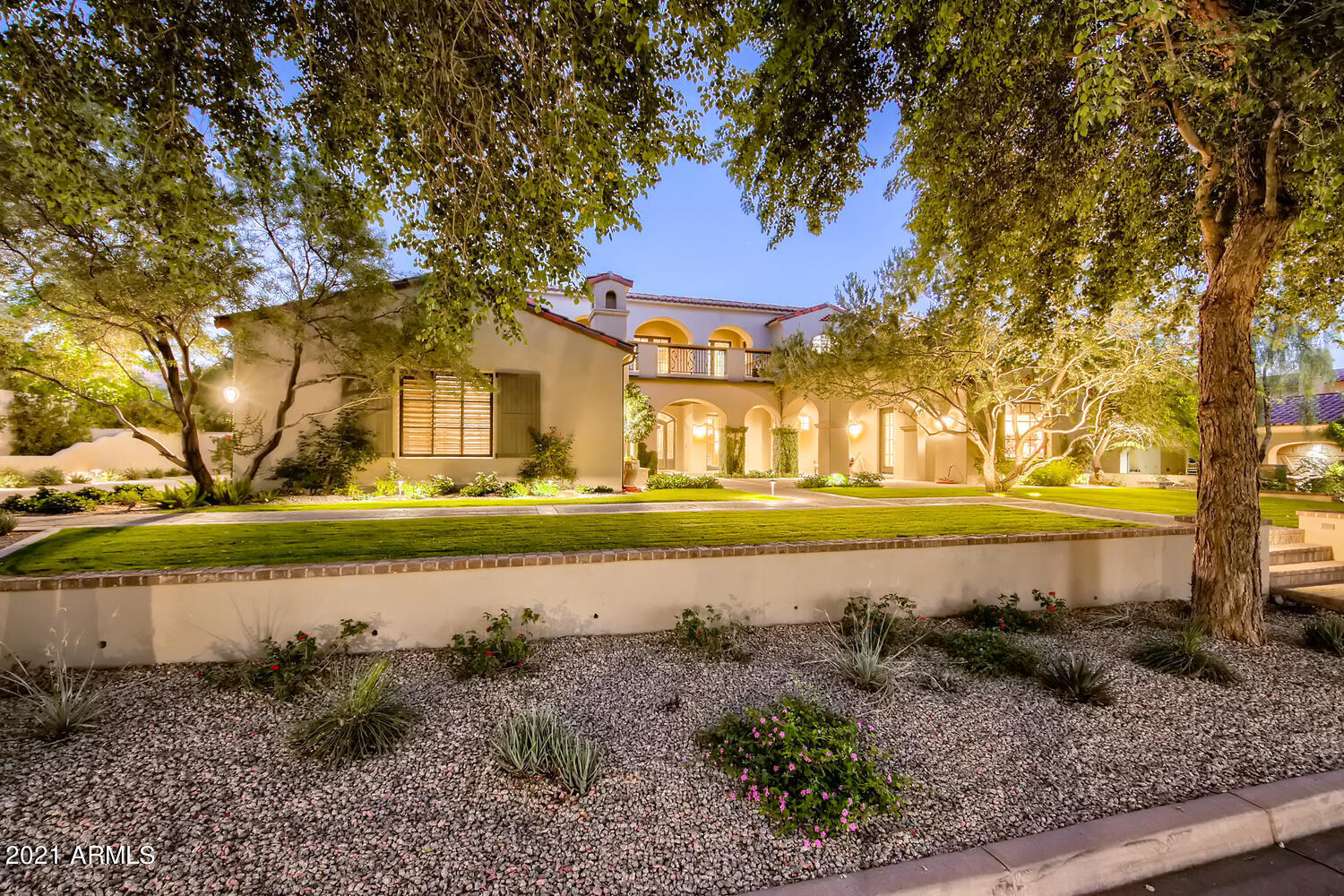Stunning Estate in gorgeous Silverleaf - Arcadia. Custom home with recent expansive remodel utilizing the highest level of quality, detail & elegance.  Gracefully landscaped front patio & outdoor fireplace will greet the most discerning guests and overlooks the peaceful and lush community park area across the street. The impressive 2-story estate encompasses over a ½ acre of manicured landscaped property.  This home features 5 bedrooms (all w/ en suite bathrooms), Guest Casita w/bath, large home office and upstairs recreation area. 6 interior baths + convenient outdoor pool bath. Impressive covered patio with room to entertain numerous guests. Enter the oversized custom iron front door and step into the grand entry featuring multiple cathedral-arched ceilings, library area w/ fireplace and formal dining room. A direct view from the front door beckons you to the back yard through a large 6 panel electric walls that disappears completely leaving an unobstructed view and access to the resort style backyard.  Wide plank oak wood flooring throughout. Magnificent living room with soaring ceiling and wood beams. Gas Fireplace, oversized windows, 3 sets of French doors leading to and overlooking the classically Mediterranean resort pool area.  Fully remodeled light and bright gourmet chef's kitchen with sparkling quartz counters, massive over-sized island, enormous Sub-Zero refrigerator/freezer, full size wine refrigerator, and Wolf double-oven w/6 burner stove plus griddle, 2 Fisher Paykel full size drawer dishwashers, Miele built-in coffee maker, 2 full size microwave ovens and so much more. Enjoy entertaining in the step-down full-size bar with built-in bar refrigerator and double window system that slides fully into both walls to enable outdoors guests to be served bar side. The Large backyard is a resort-style area with room for a trampoline and breathtaking cobalt blue fully-tiled pool and large tiled spa.  Outdoor built-in barbeque, sink & kitchen area completes the entertaining space. 4 Minute drive to the Silverleaf Country Club. Minutes to fine dining & shopping. See this one of a kind estate today !