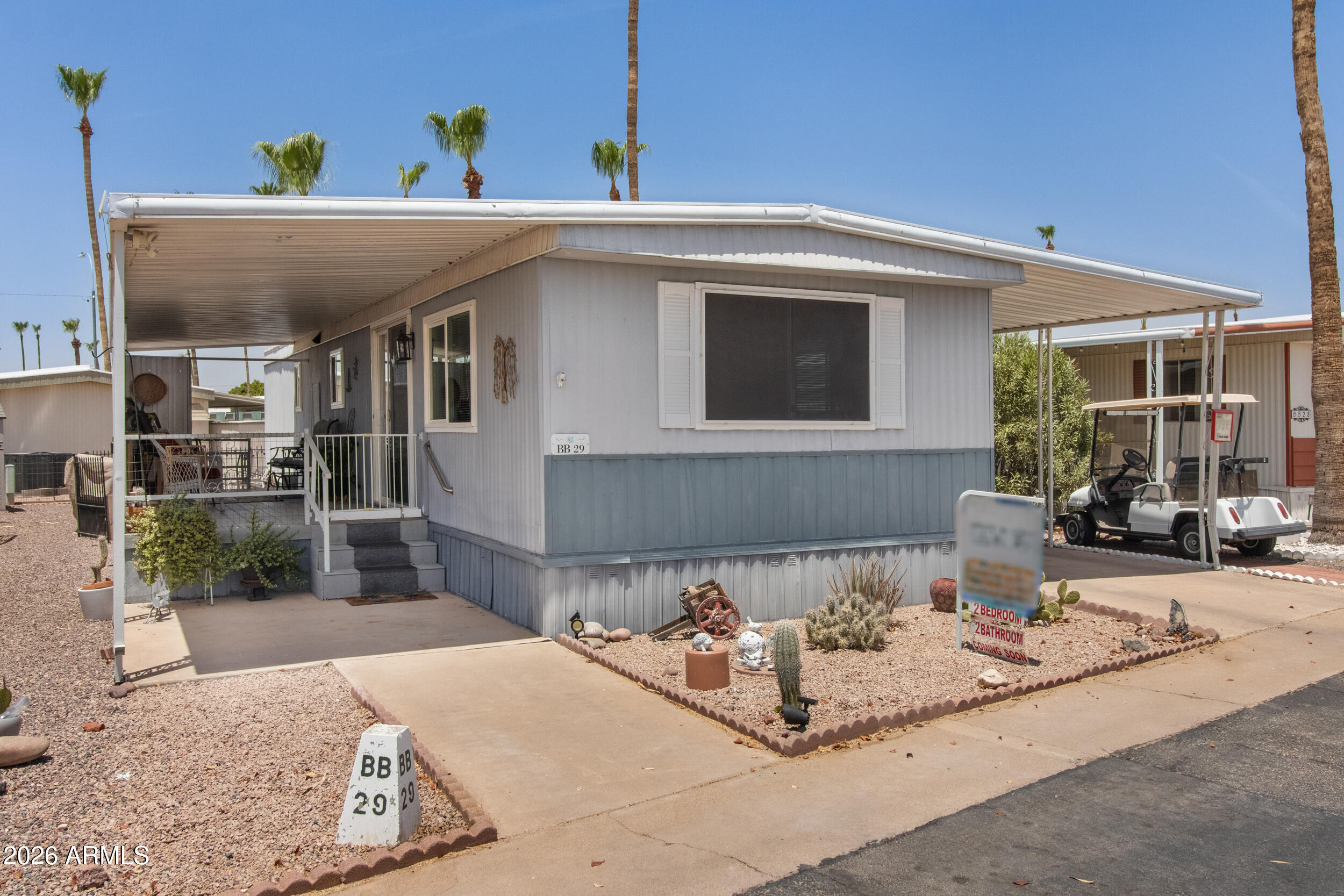 ***FULLY FURNISHED***WELL MAINTAINED UPDATED 2 BEDROOM 2 BATHROOM 1975 CAMERON 784 SQ FT, NICE COVERED GATED LARGE COMPOSITE DECK WITH PRIVACY PANELS, FULLY FENCED IN LARGER YARD AND STORAGE SHED, DUAL PANE WINDOWS AND ARCADIA SLIDING GLASS DOOR,2 PANEL ARCHED INTERIOR DOORS, BOTH BATHROOMS HAVE WALK IN SHOWERS & EQUIPPED WITH GRAB BARS, RAISED TOILETS, REMOTE ROLLER SHADE ON MASTER BEDROOM WINDOW,2ND BEDROOM HAS SEPERATE ACCESS FROM CARPORT,BARN DOOR SEPERATES THE 2ND BEDROOM TO HALLWAY AND MASTER BEDROOM, NEW GARBAGE DISPOSAL,AGAVE VILLAGE IS A 55+ACTIVE ADULT,GATED COMMUNITY WITH 2 HEATED POOLS,HOT TUBS,COMMUNITY CENTER,FITNESS ROOM,BOCCE BALL,PICKLEBALL,COMMUNITY PARK,BARBECUE PAVILION,SHUFFLEBOARD,COMPUTER ROOM,ACTIVITIES AND MORE!LOT RENT $885.00 A MONTH,***RENTALS OK***