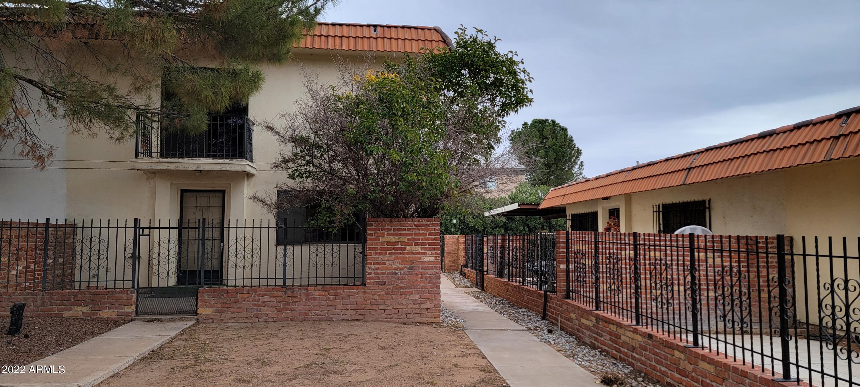 Here is a great opportunty to purchase a reasonably priced property that would make a great starter home or rental unit, perfect for snow birds too. This townhome is a 2 story end unit with a 2 car carport. Both bedrooms are upstairs and there is a full bath upstairs. 1 bedroom also has a balcony that overlooks the common area towards the community pool. Downstairs there is a 1/2 bath, living, dining and kitchen. There is a laundry room in a room in the carport and the washer and dryer remain.