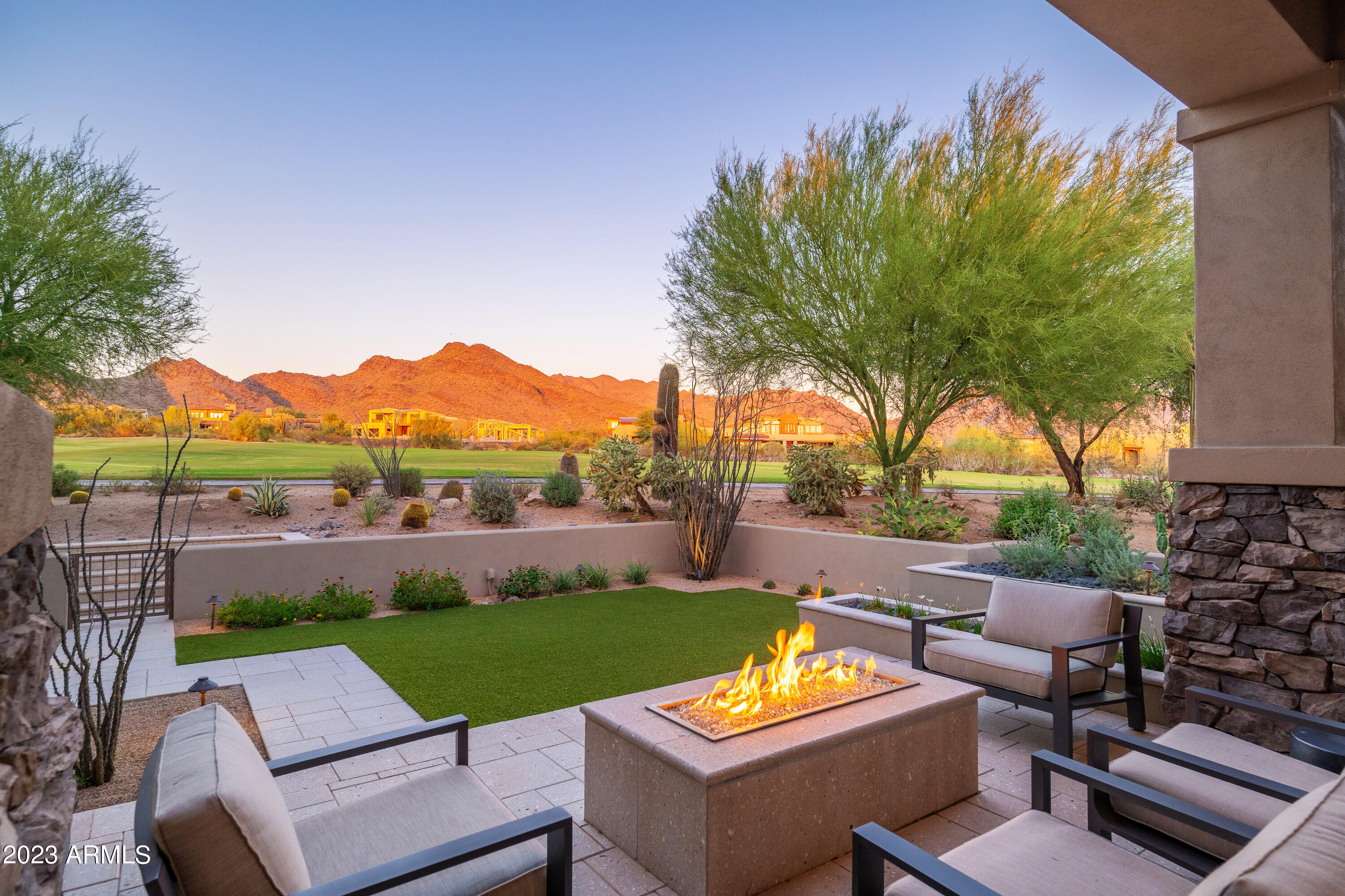 A rare golf course opportunity in the Country Club at DC Ranch. This Tapadero unit is  behind the gates at DC Ranch and is a rare find.  Not a single surface was untouched in the remodel that occurred in 2019. This exquisite home boast all the finishes that one would expect in every corner of custom home. Kitchen, baths, appliances, flooring and lighting will take your breath away. Perfectly situated between the ninth green and the eighteenth fairway of the Country Club at DC Ranch, the unobstructed golf and mountain views are epic. With only a two minute walk, you are swimming dining, working out or golfing. The home is just under 3,800 square feet with 4 bedrooms and 4.5 baths. A beautiful spa is  placed in the entry courtyard for perfect privacy. This is a must see.