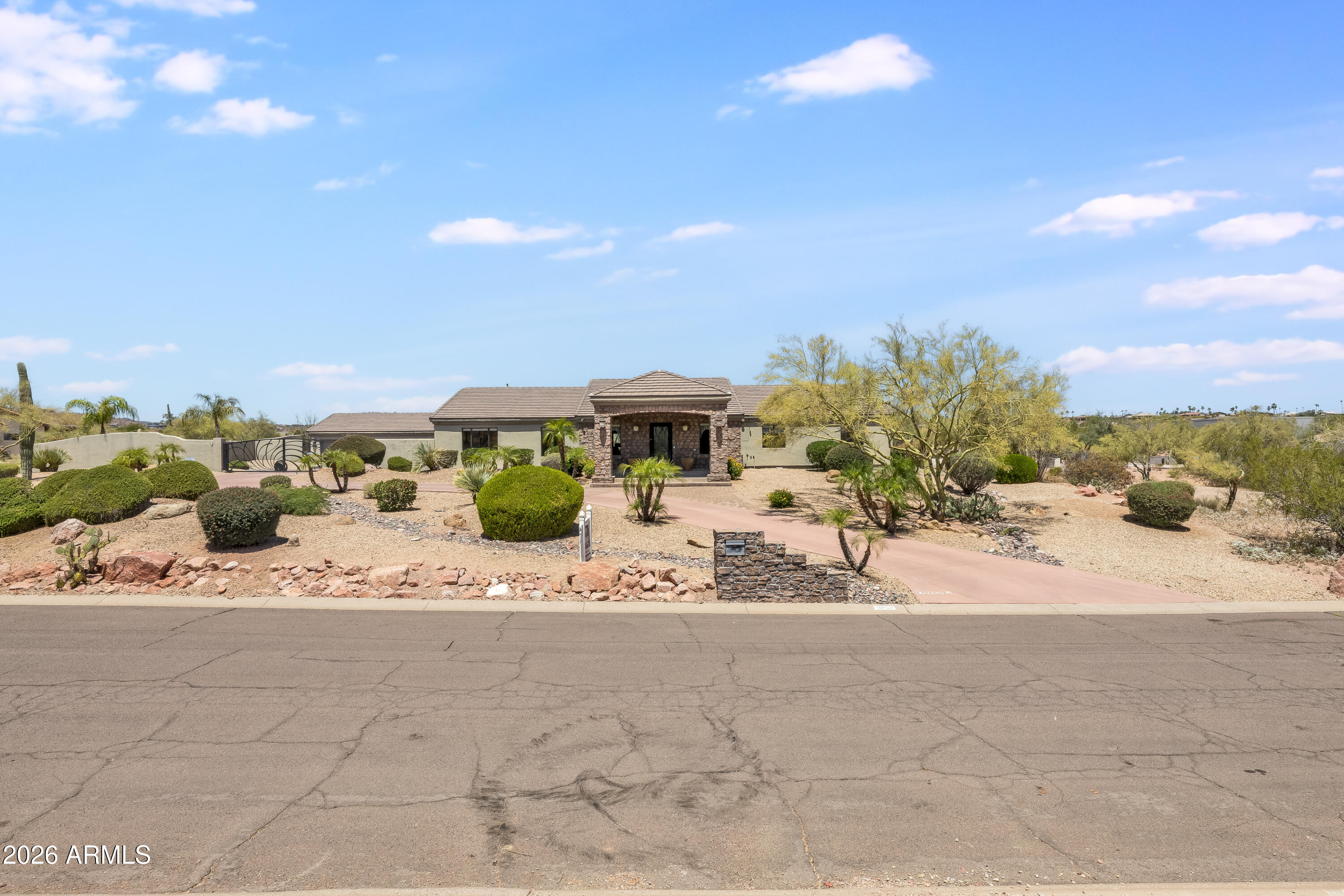 3-bedroom+ office features Open floorplan   Mountain front & back, detached 3-car garage, private gated, governor's drive, heated pool, and no carpet throughout. Situated on a spacious lot, this beautifully upgraded home features vaulted ceilings, custom travertine flooring, granite countertops, cherry cabinets and abundant natural light throughout.

The entertainer's kitchen serves as the heart of the home with bar seating, oversized walk-in pantry, extensive cabinetry, and seamless flow into the main living spaces. Dedicated office with custom built-ins creates the perfect work-from-home setup. Additional highlights include upgraded sinks, faucets, display lighting, spacious laundry room with washer and dryer included, and fantastic storage throughout.