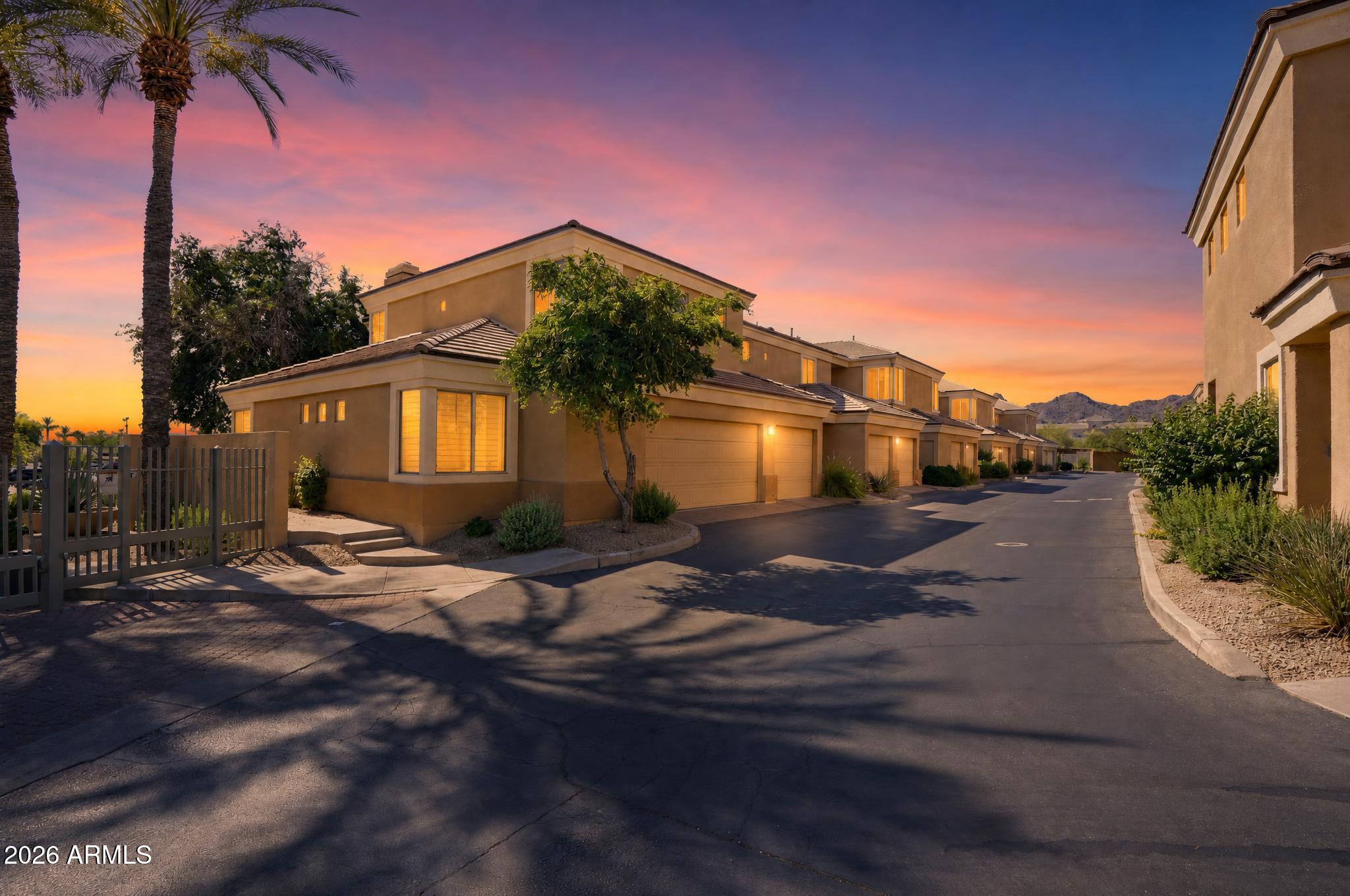 This two bedroom/two bathroom single level floor plan is split and ideal for two residents wanting some privacy. Light and bright with open kitchen to family room plus a large dining area. Roomy garage, brand new hot water heater and the AC is only two years old! The gated complex has a lovely pool and tucks into the side of a mountain. Close proximity to hiking, mountain biking and everything the Phoenix Preserve has to offer! Fun restaurants within walking distance too! LOCATION LOCATION LOCATION!