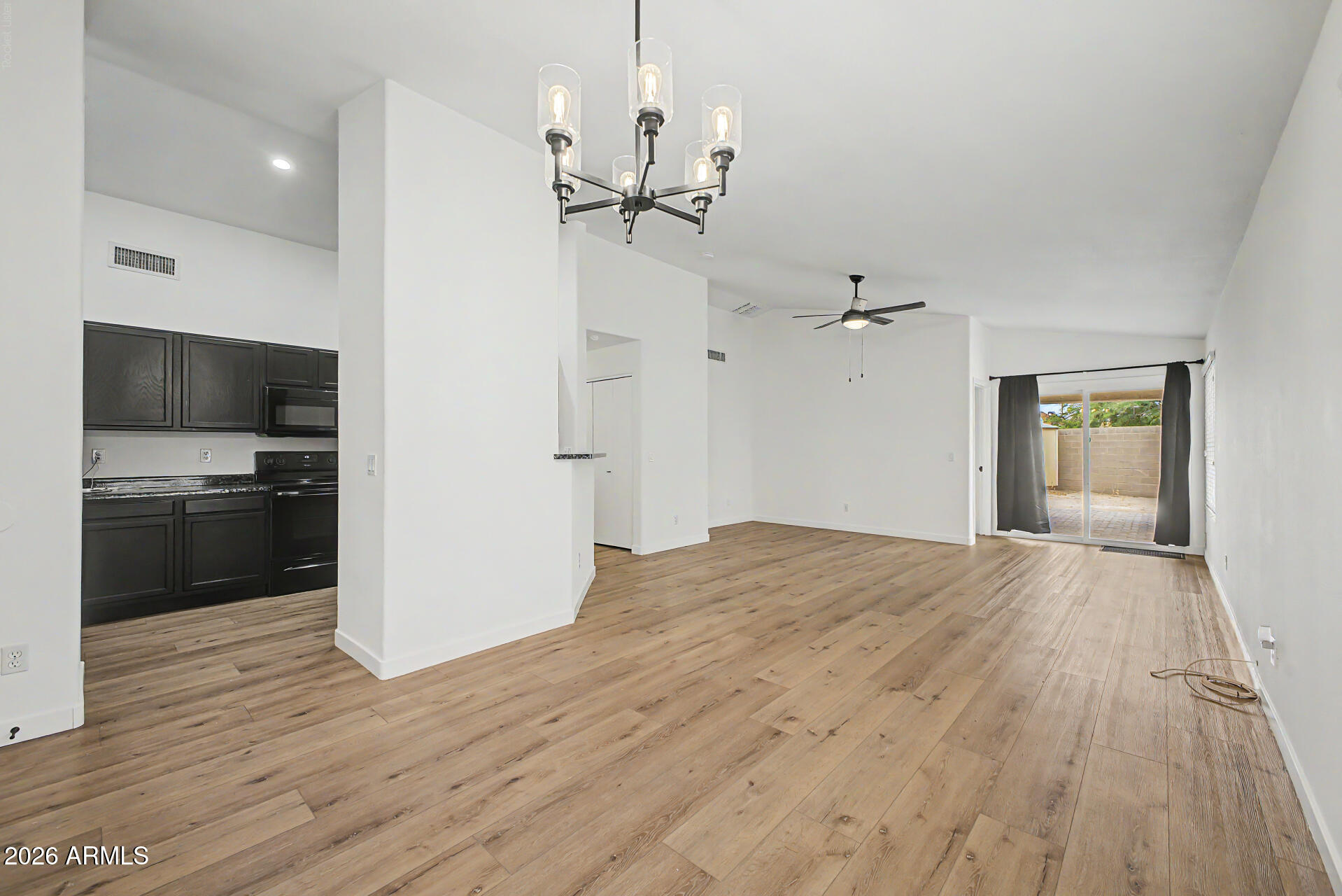 Fully Remodeled Move-In Ready Inviting Home on an Oversized Cul-de-Sac Lot! This bright, open floor plan features vaulted ceilings, beautiful white oak wood-look flooring throughout, fresh paint, new interior doors, and stylish black finishes that give the home a clean, modern feel and on current trend. The kitchen and bathrooms have been tastefully updated with black cabinetry, creating a cohesive designer look throughout.
Situated on a spacious 8,000 sq. ft. corner lot with no neighbor to the left, you'll enjoy added privacy. The RV gate provides easy access to the oversized backyard, offering plenty of space for a pool or your own outdoor entertaining.  Oversized two car garage with water softener.  All the major items including roof and A/C are newer.  Just waiting for the new owner!